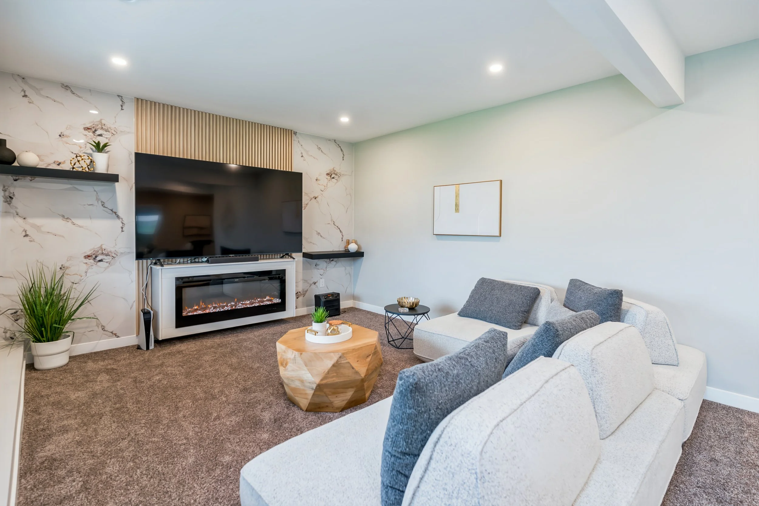 061 electric fireplace in luxury headingley home.jpg