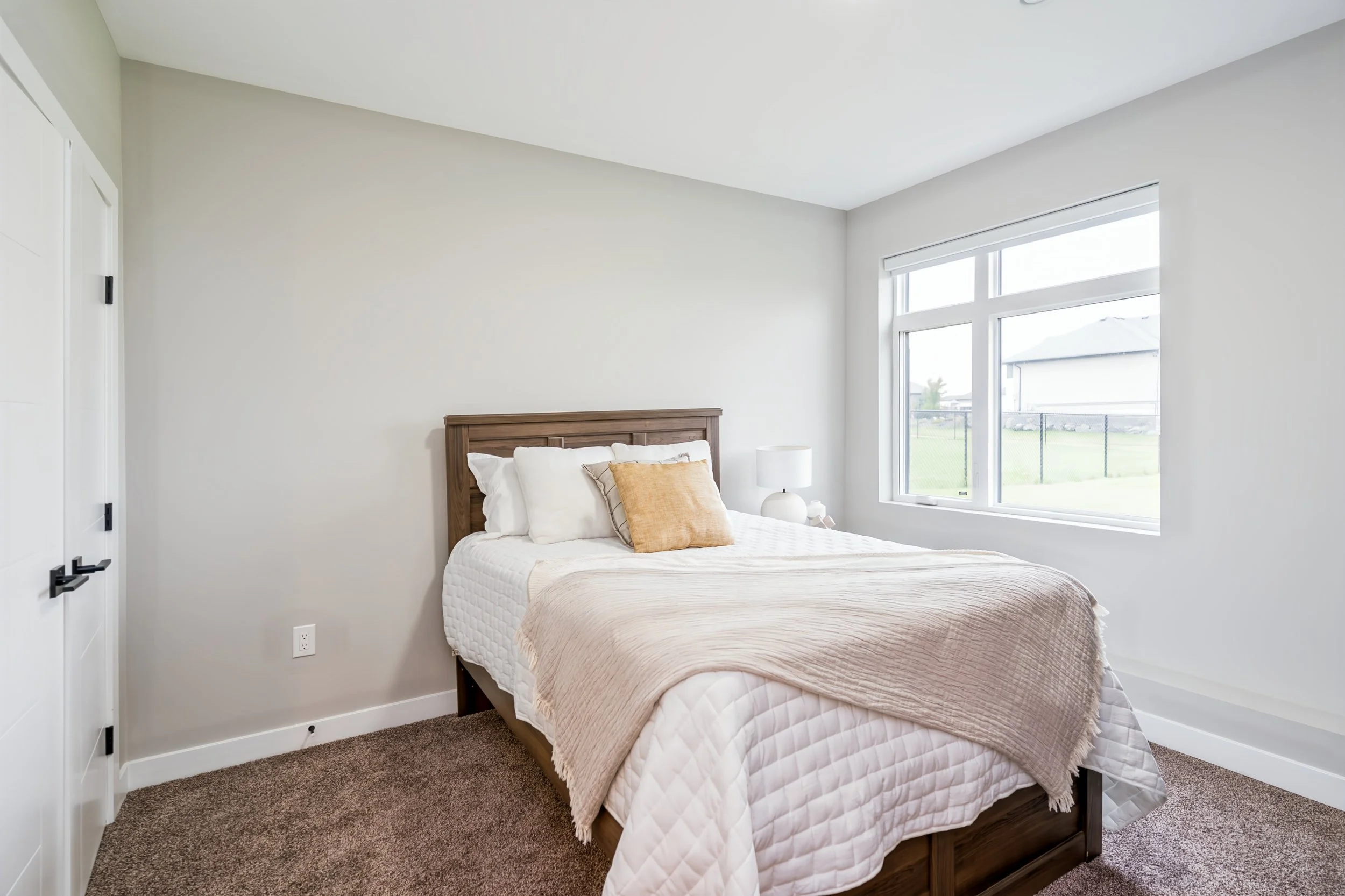 065 First lower-level bedroom with a legal egress window..jpg