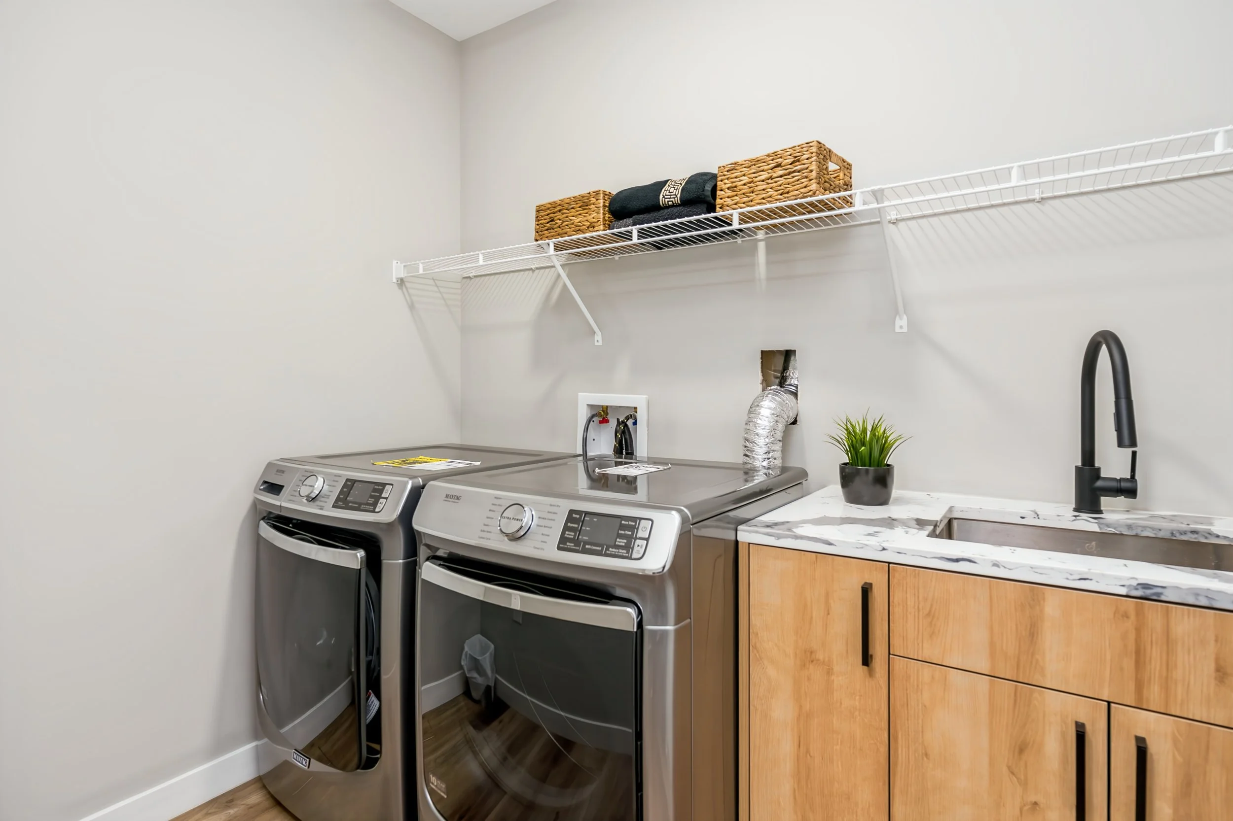 076 Oversized laundry room in the lower level..jpg