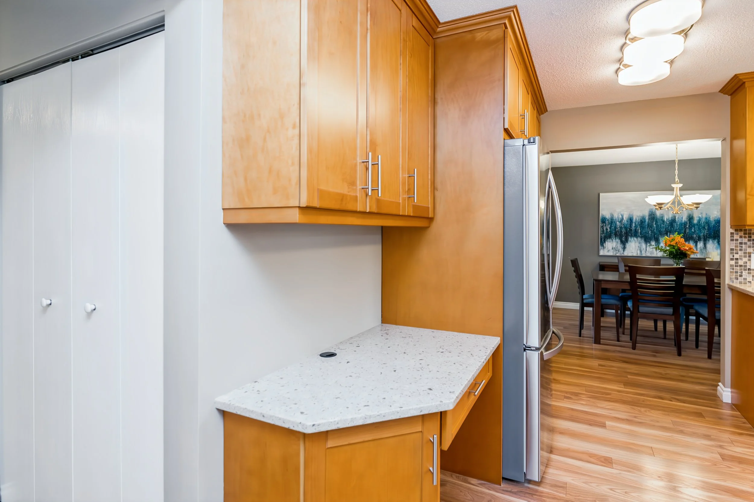 011 Alternate view of the maple cabinetry and quartz counters..jpg