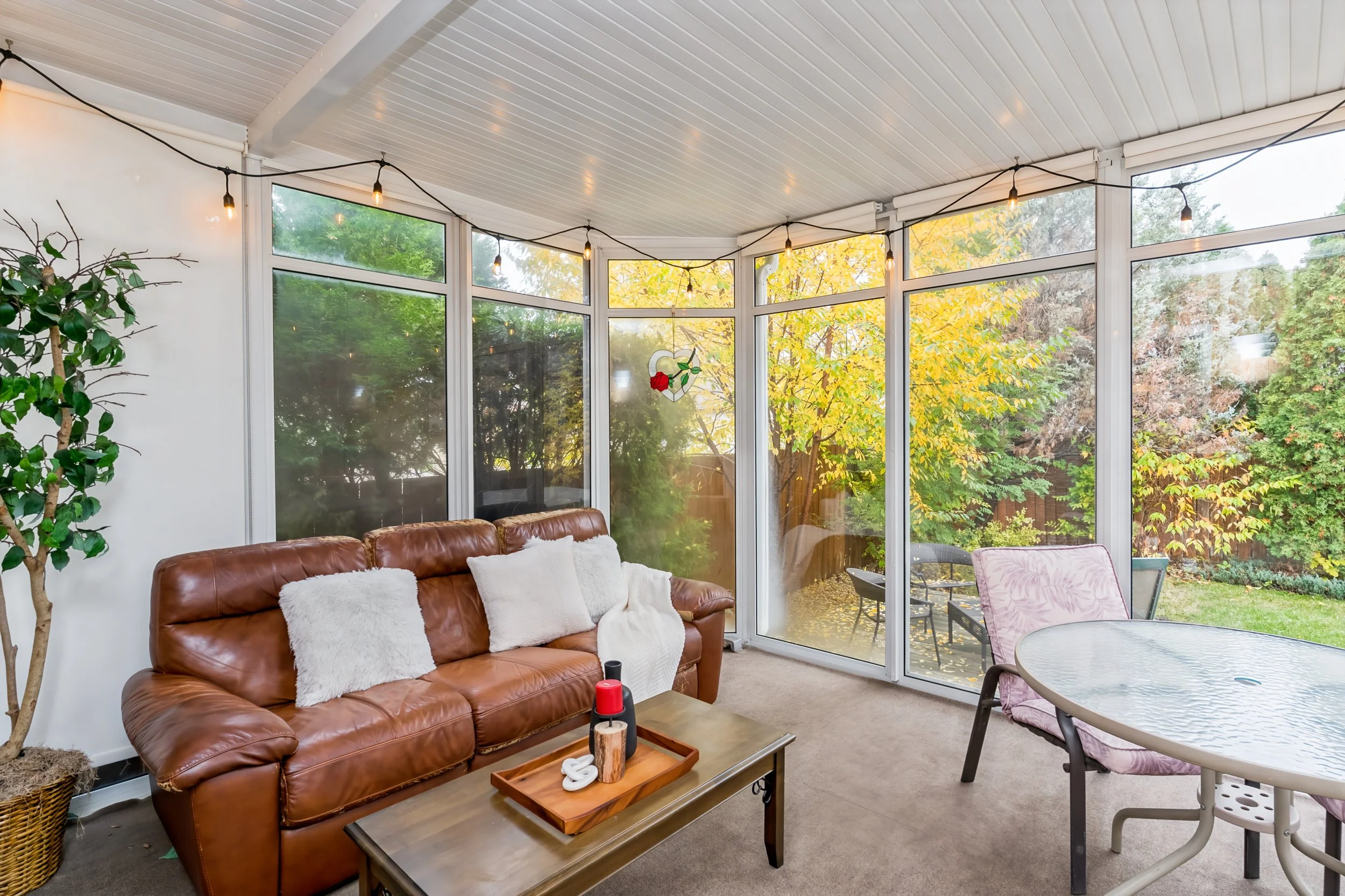 019 Spacious sunroom overlooking the backyard..jpg