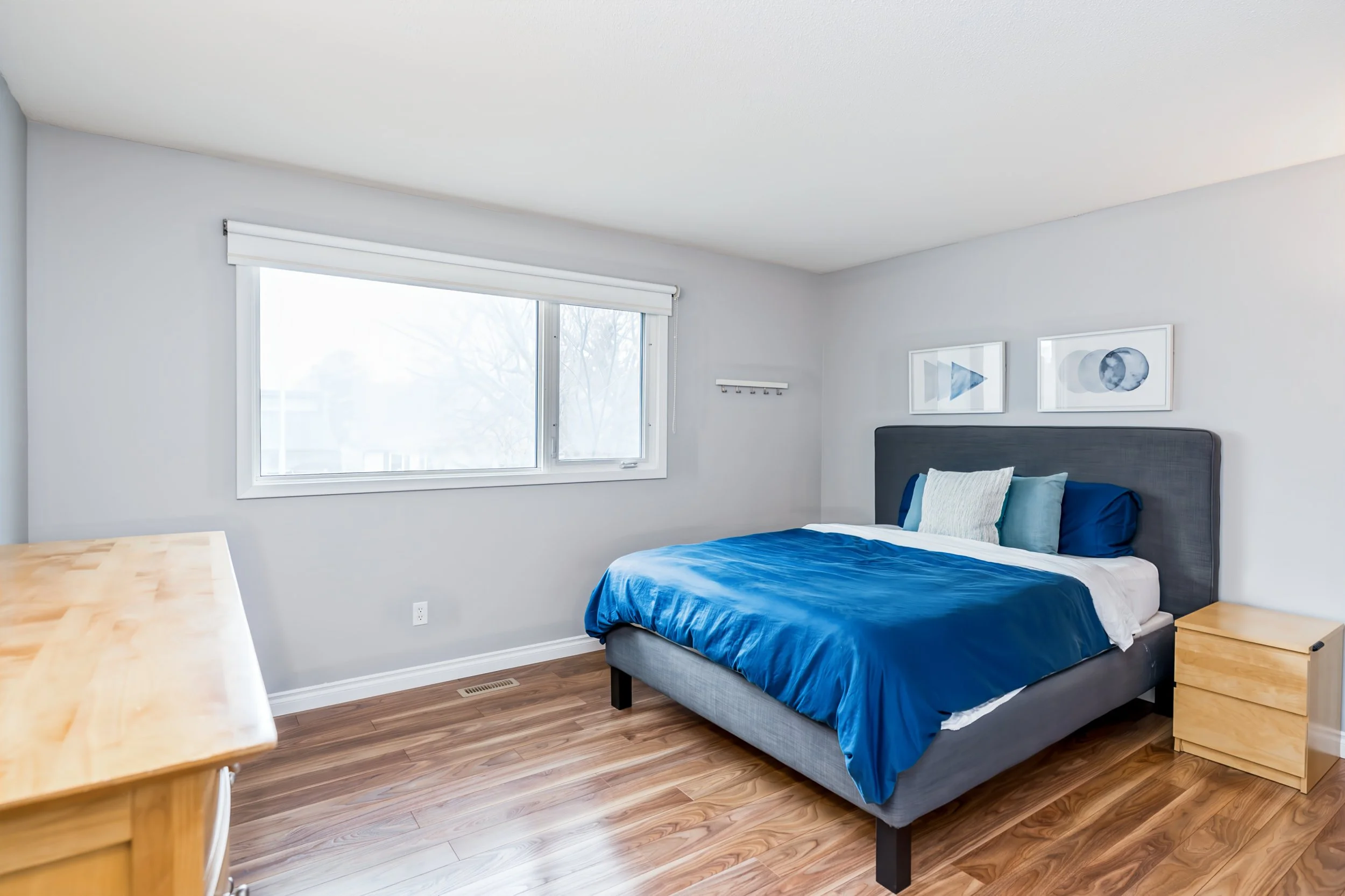 023 Primary bedroom with laminate flooring..jpg