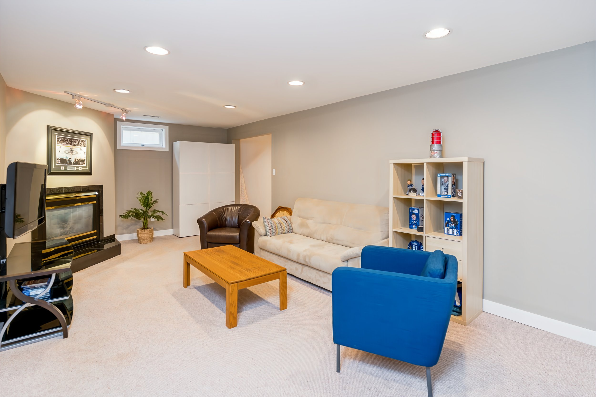 034 Finished basement rec room at 130 Whitley Drive..jpg