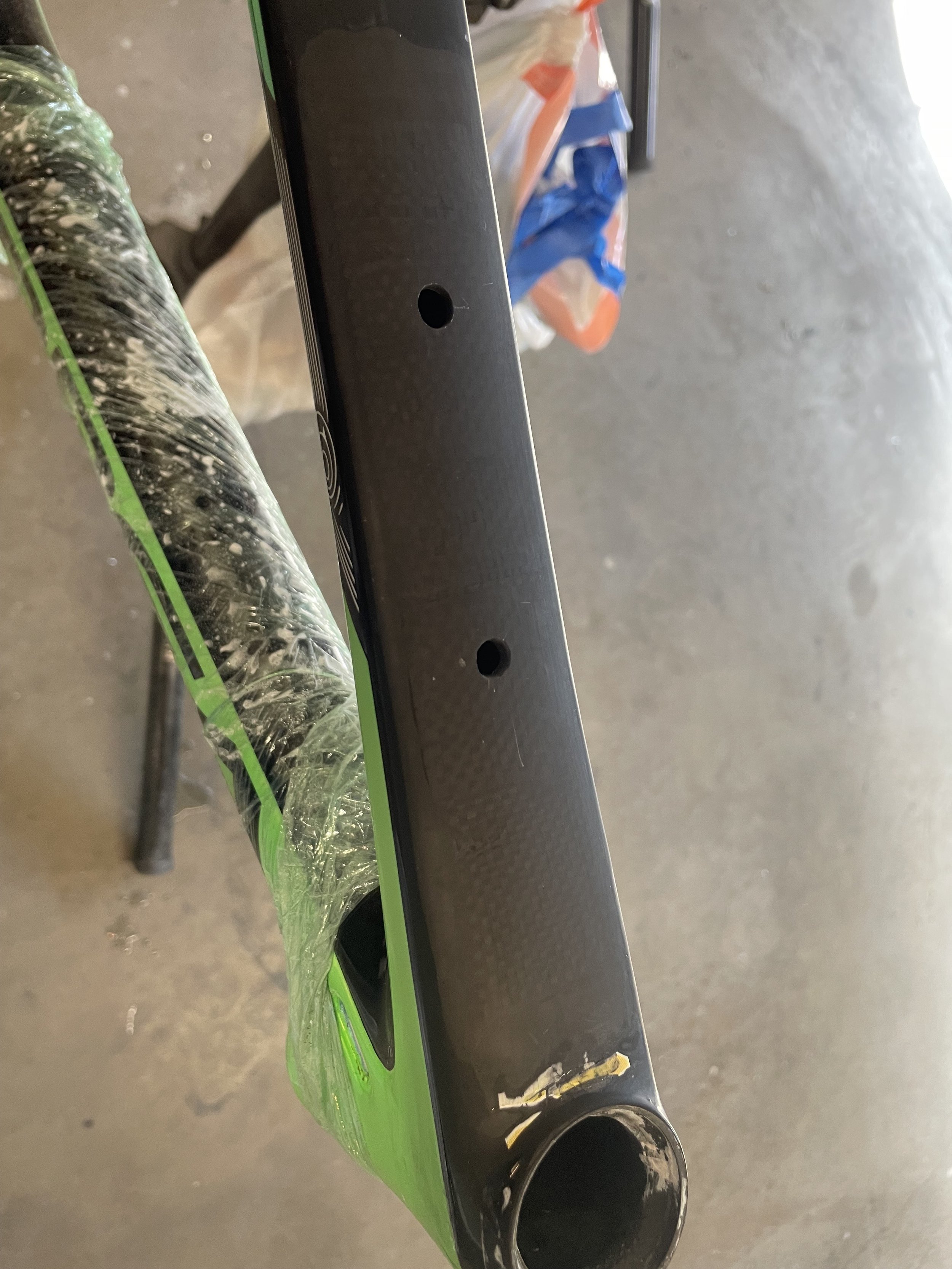 This photo was taken in the middle of the drilling process. These holes get cleaned up by hand to get rid of any irregular edges and ensure a tight fit for the inserts to drop into