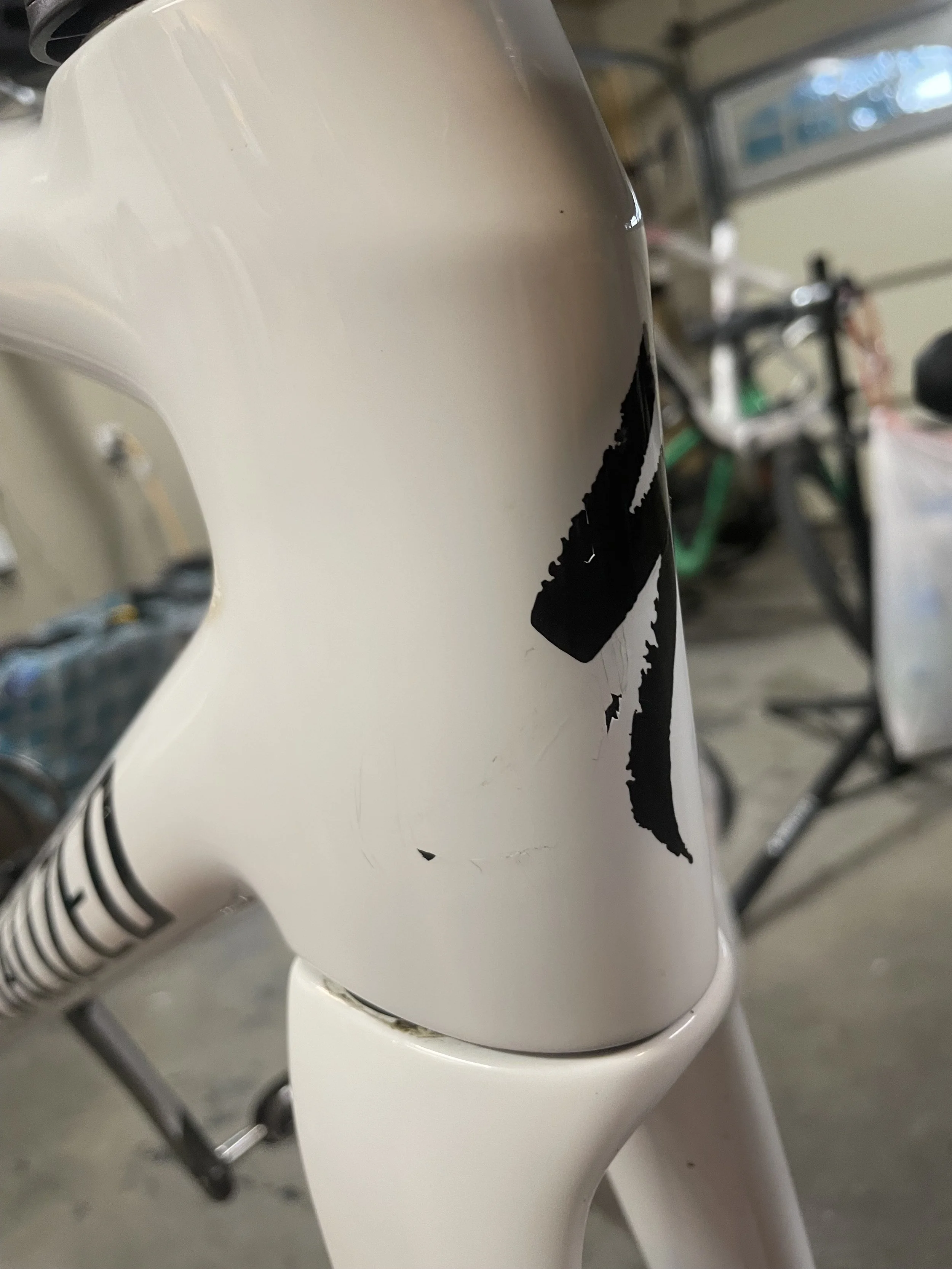 The crack on this headtube was visible in the paint and the impact area was soft when squeezed by hand