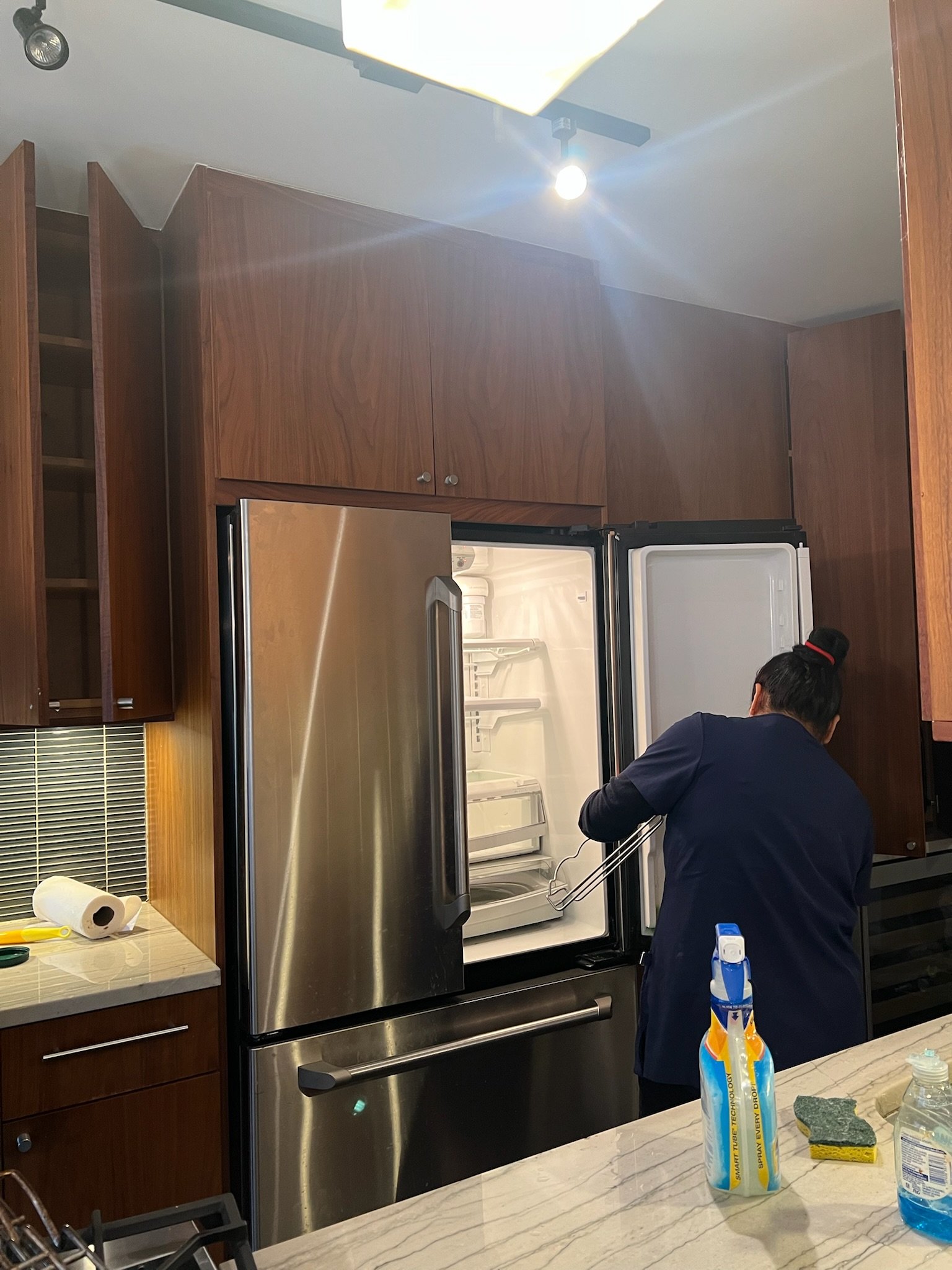 Inside fridge cleaning in a sleek Upper East Side (UES) apartment. We tackle every drawer and shelf so your appliances are spotless and fresh.