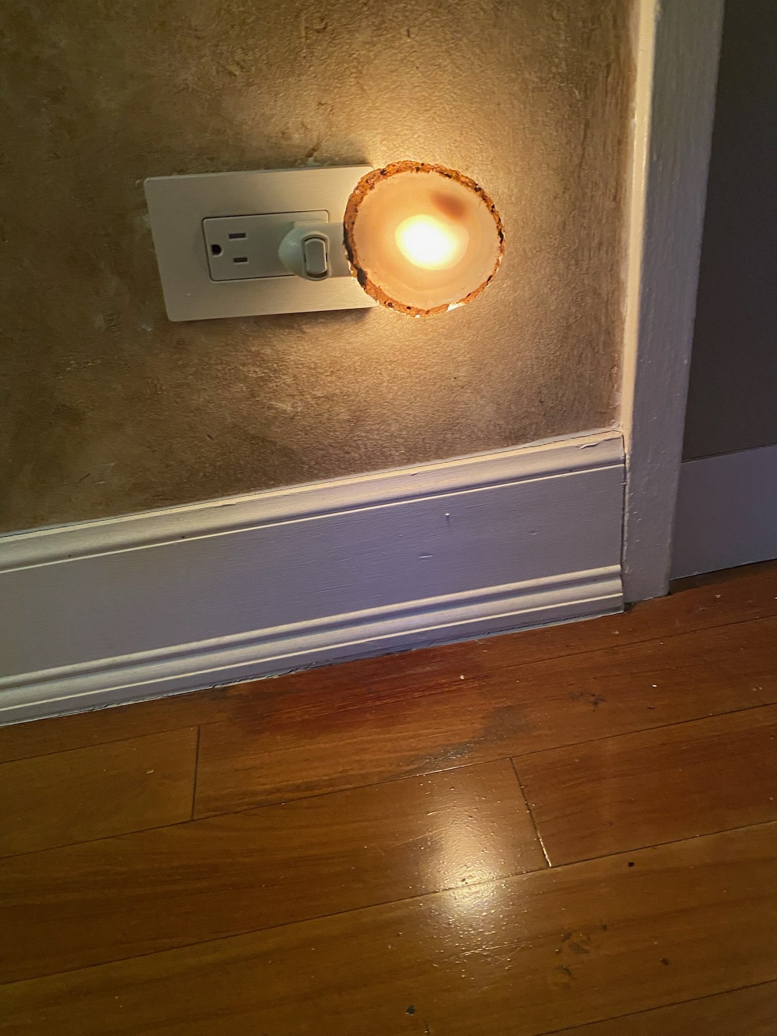 After a photo of a small wall repair in a cozy Upper East Side (UES) apartment. Simple fixes like patching and painting make a big difference in the final look.