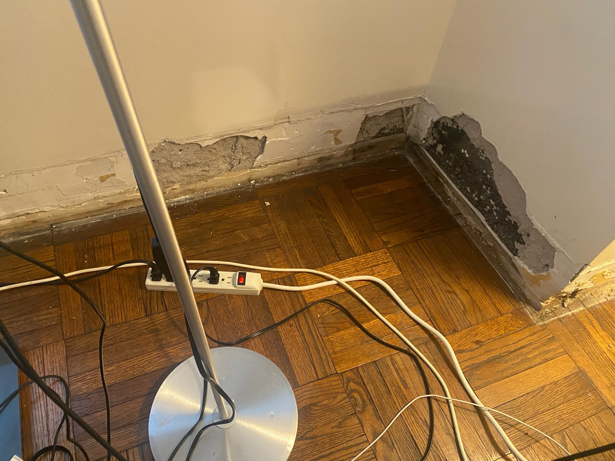 Wall repair before painting on the Upper East Side (UES). We patch damaged plaster and prep surfaces for a smooth, seamless finish.