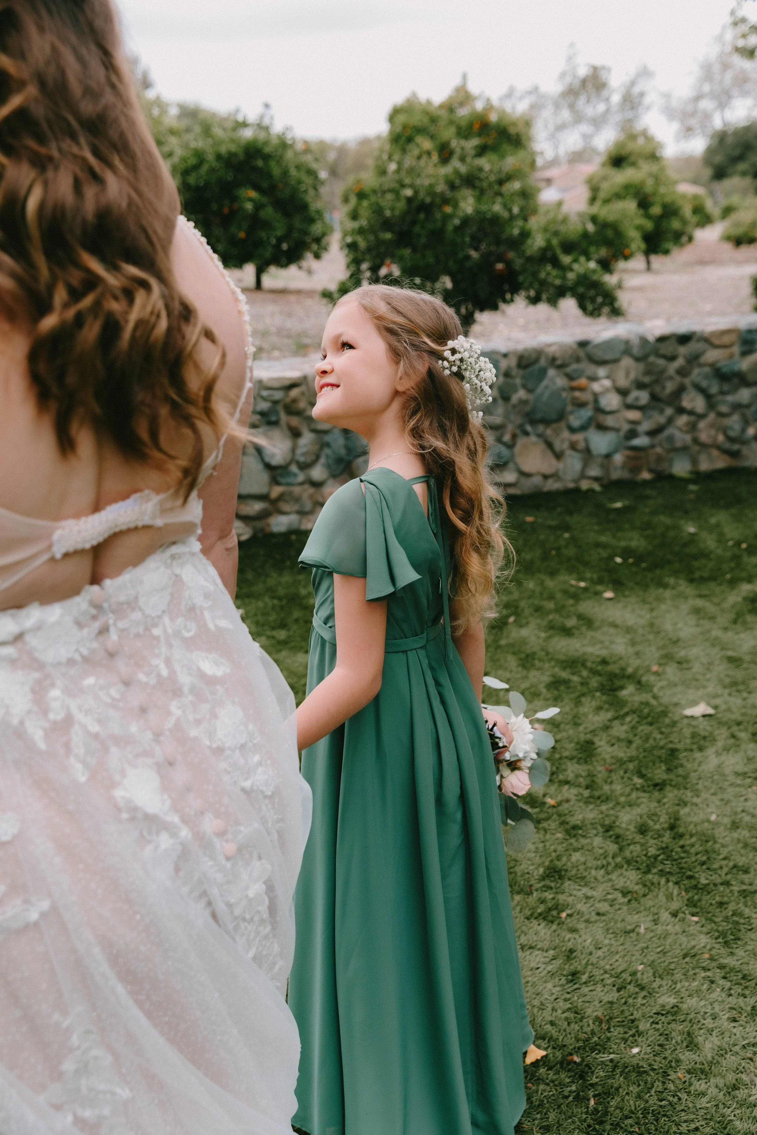 Bride portrait with flower girl in the orange groves at Santiago Oaks Regional Park in Orange, CA — Southern California wedding photographer Tesla Rae Photo based in Huntington Beach