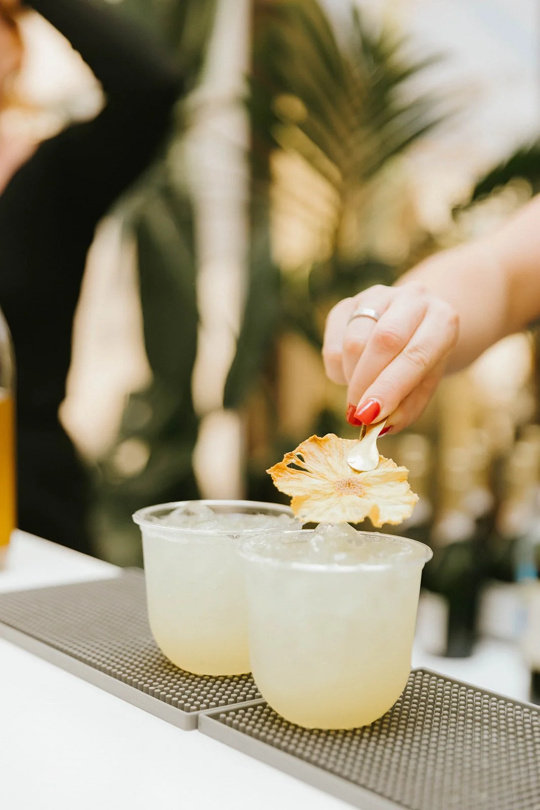 Beautiful drinks being prepared at upscale, mobile bar during couples engagement party at The Shindy in Costa Mesa— Orange County event photographer Tesla Rae Photo