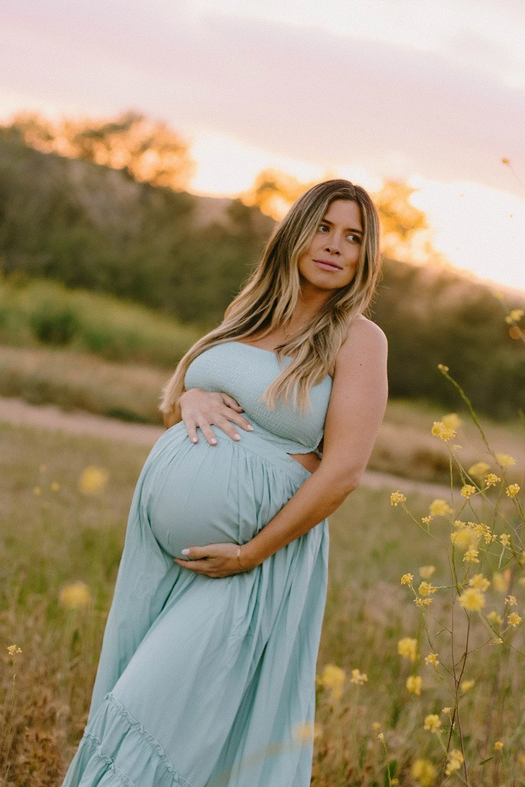 Maternity session at sunset in golden field in Laguna Beach — Best maternity photographers in Orange County — Tesla Rae Photo