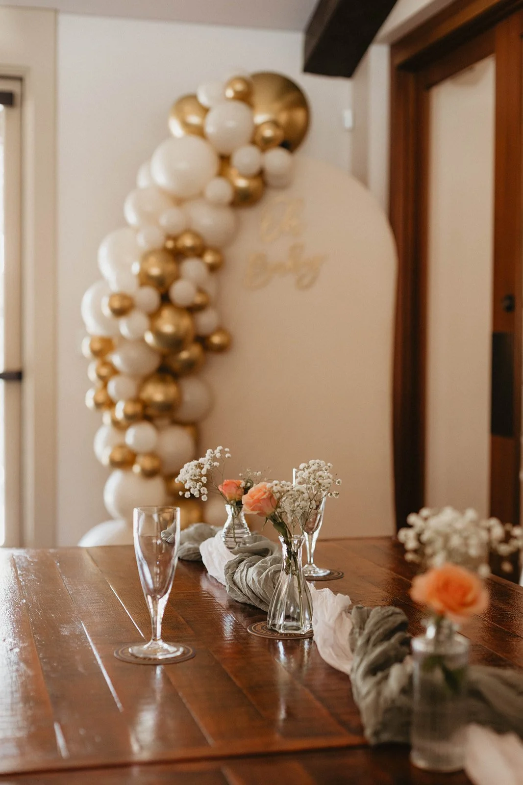 Stunning balloon arch decor at baby shower at Nellie Gail Ranch Clubhouse in Laguna Hills — Orange County event photographer Tesla Rae Photo