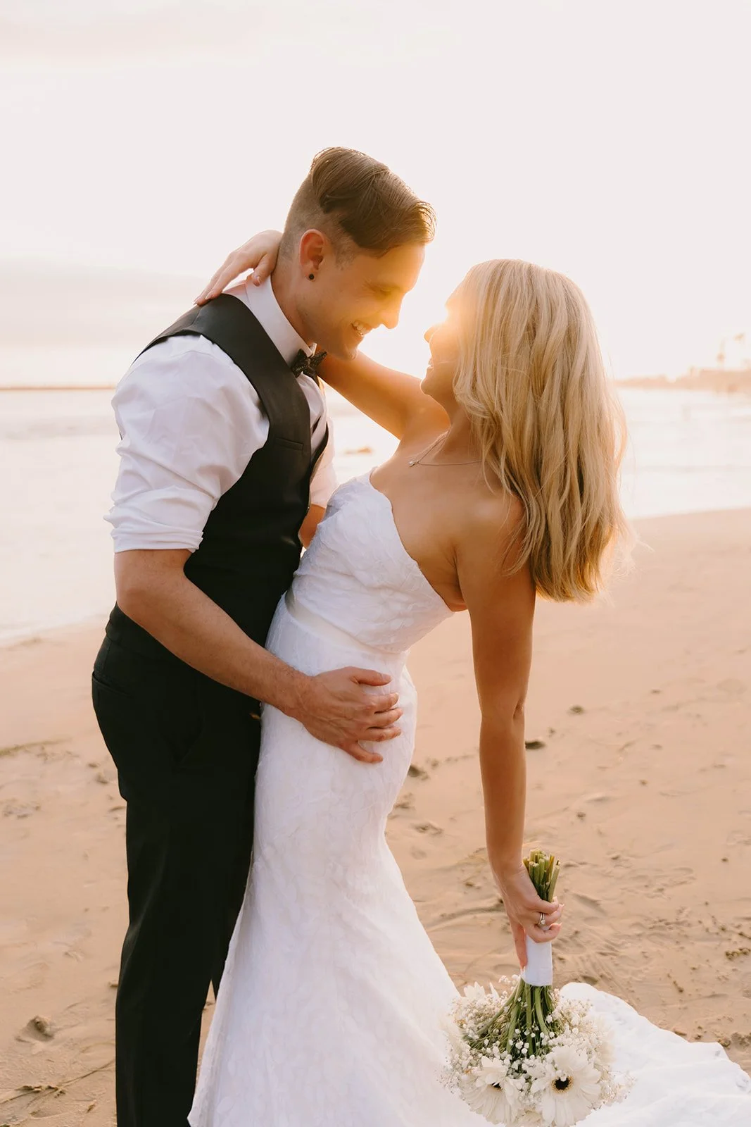 Bride and groom portrait at Corona Del Mar beach — Southern California wedding photographer Tesla Rae Photo based in Huntington Beach