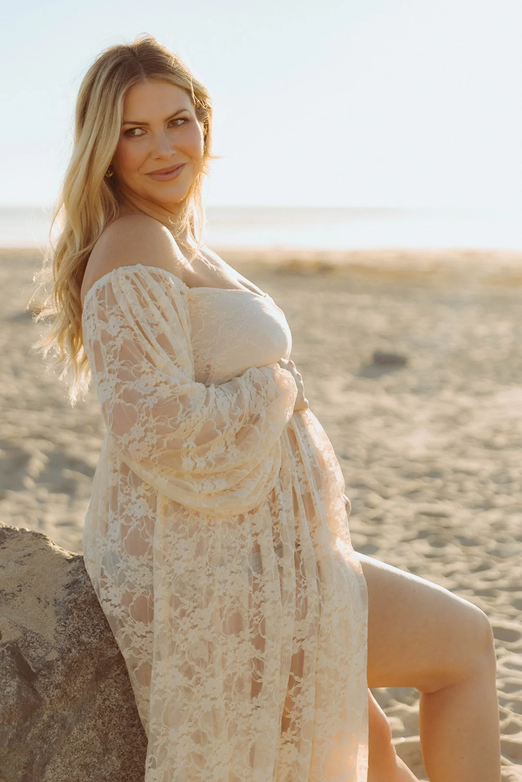 Dreamy maternity portraits at Huntington Beach during golden hour — Award-winning maternity photographer in OC — Tesla Rae Photo