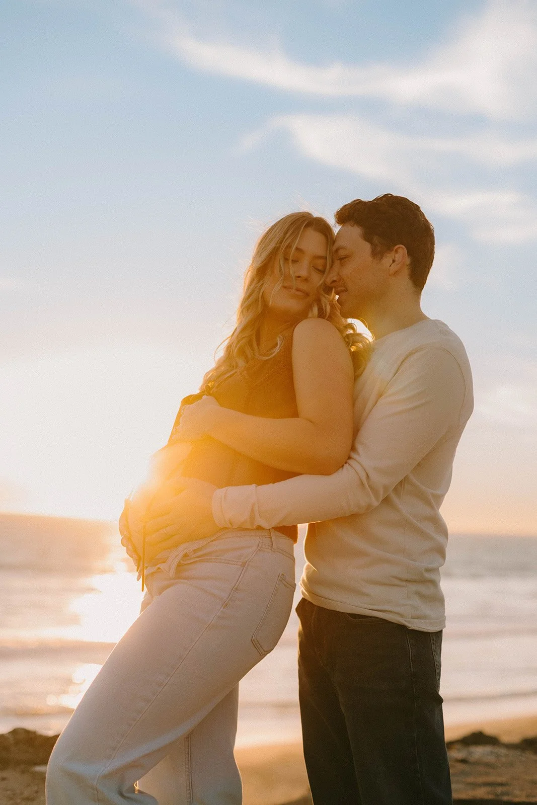 Maternity session at sunset on the beach in Huntington Beach  — Best maternity photographers in Orange County — Tesla Rae Photo