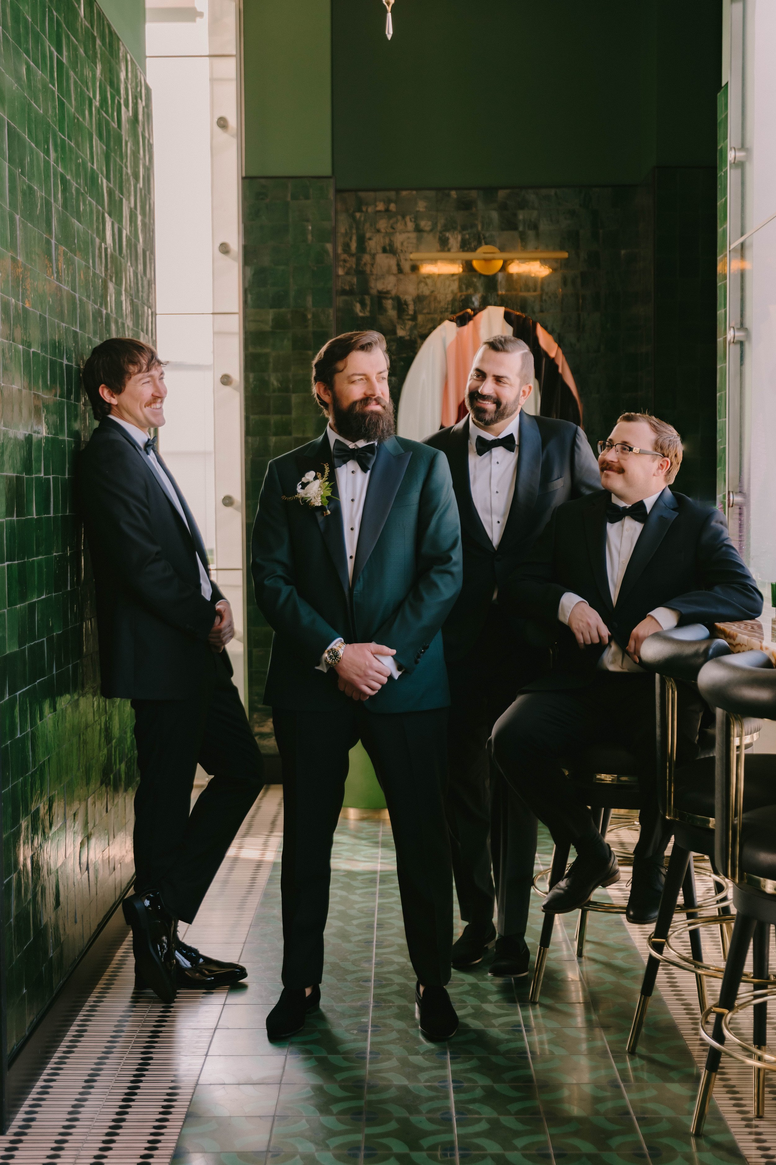 Groom portraits with his groomsmen getting ready at Fairmont Breakers Hotel Long Beach — Long Beach wedding photographer Tesla Rae Photo