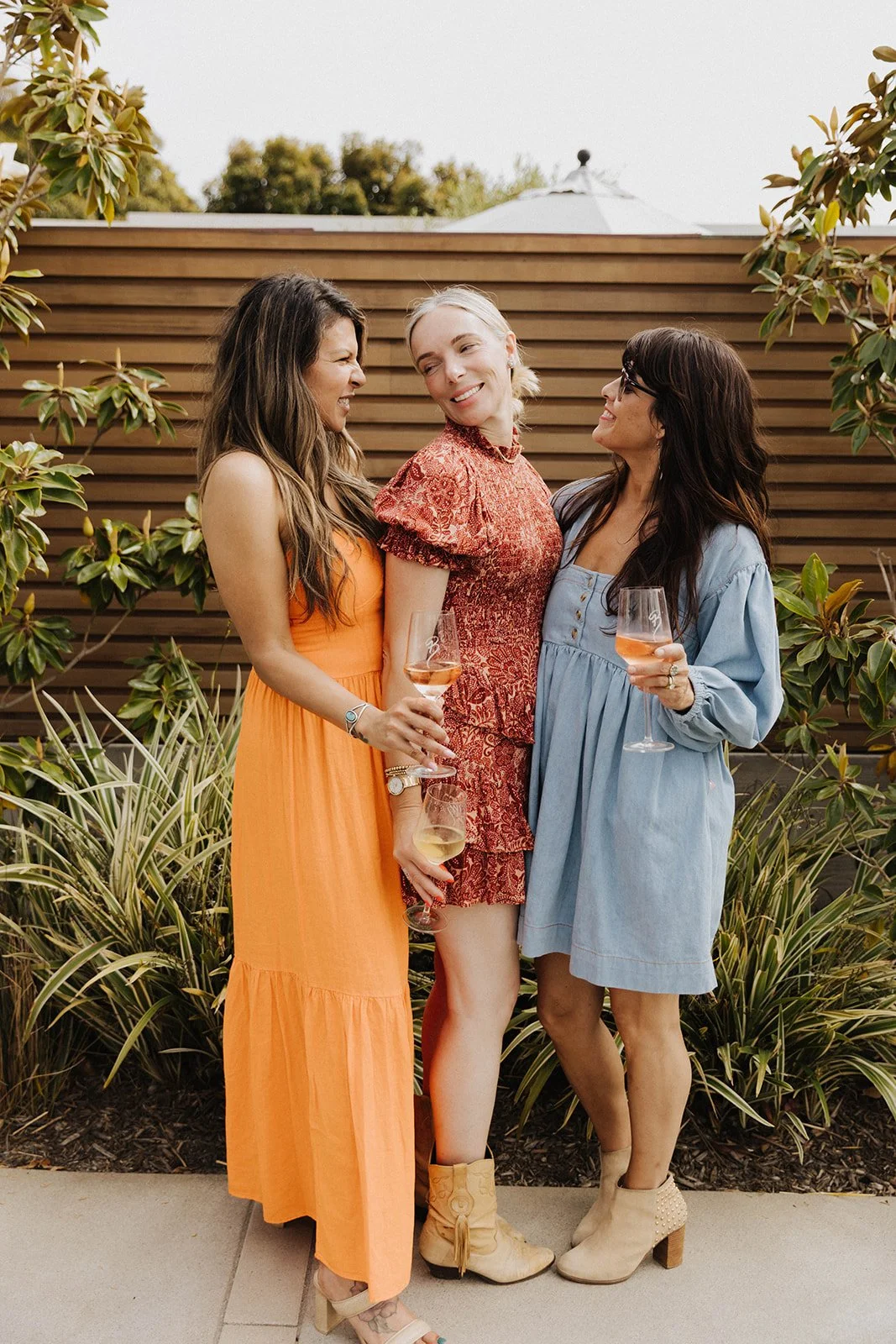 Champagne toast at intimate ladies' networking event at Bianchi Laguna Beach— Luxury event photographer Tesla Rae Photo based in Southern California