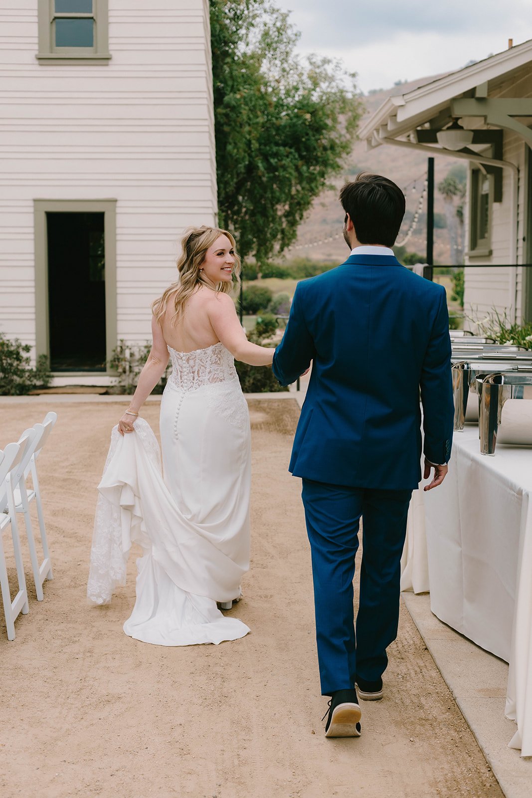 Bride and groom candid portrait at The Swanner House in San Juan Capistrano — Southern California wedding photographer Tesla Rae Photo based in Huntington Beach