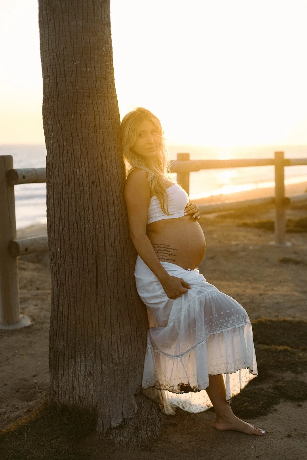 Maternity session at sunset on the beach in Huntington Beach  — Best maternity photographers in Orange County — Tesla Rae Photo