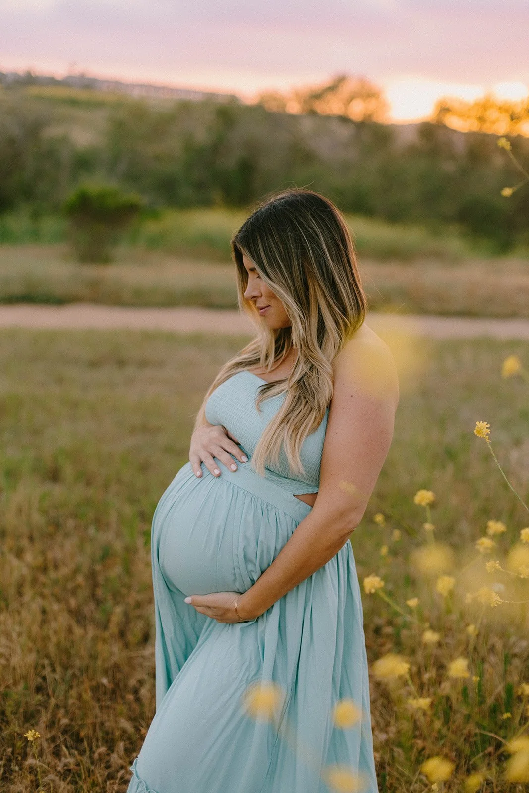 Maternity session at sunset in golden field in Laguna Beach — Best maternity photographers in Orange County — Tesla Rae Photo