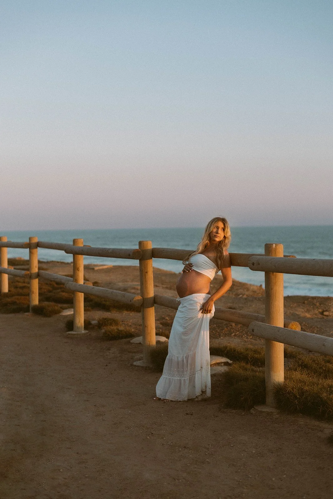 Maternity session at sunset on the beach in Huntington Beach  — Best maternity photographers in Orange County — Tesla Rae Photo