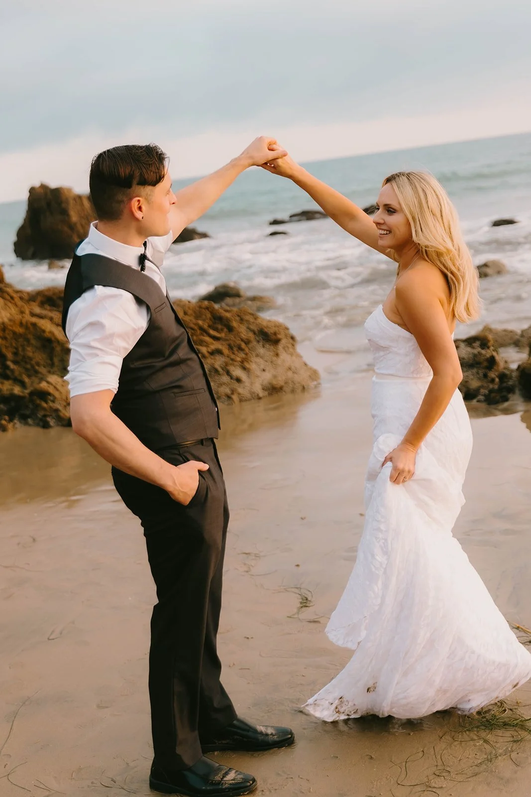 Bride and groom portrait at Corona Del Mar beach — Southern California wedding photographer Tesla Rae Photo based in Huntington Beach
