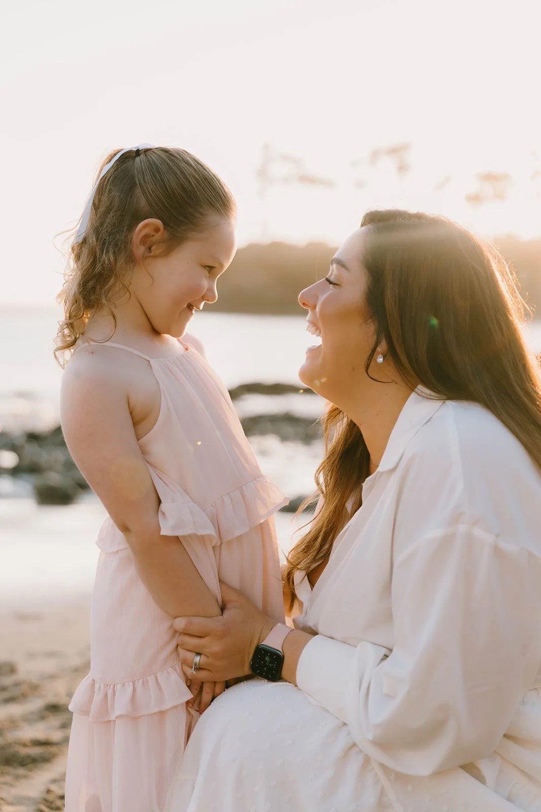Carefree family laughing and playing at Laguna Beach — Best candid family photographers in Laguna Beach — Captured by Tesla Rae Photo