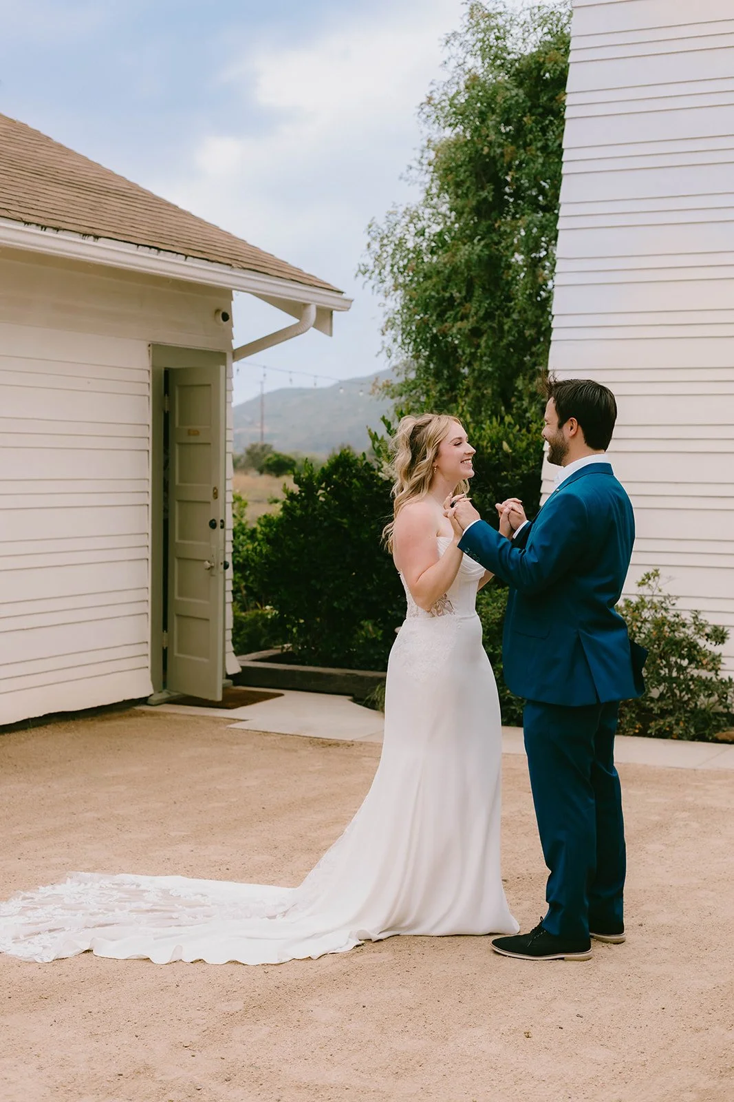 Bride and groom candid portrait at The Swanner House in San Juan Capistrano — Southern California wedding photographer Tesla Rae Photo based in Huntington Beach