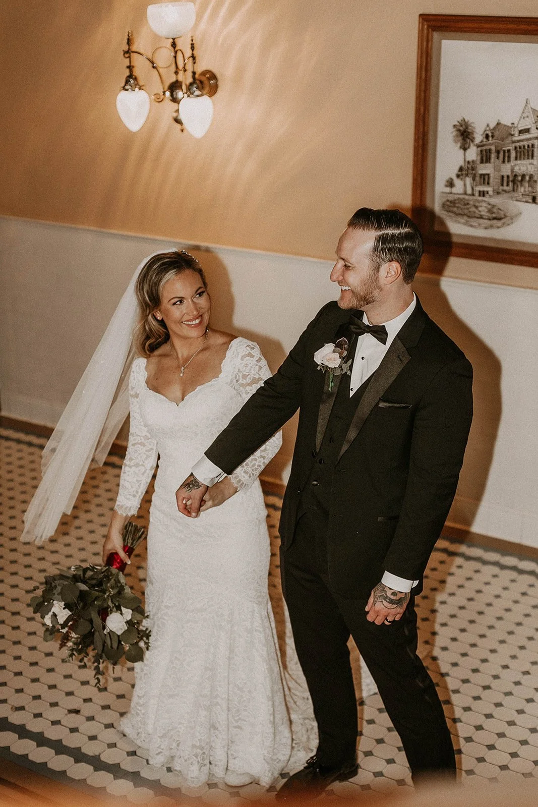 Bride and groom portrait at their courthouse elopement at the Old Orange County Courthouse in Santa Ana — Southern California wedding photographer Tesla Rae Photo based in Huntington Beach