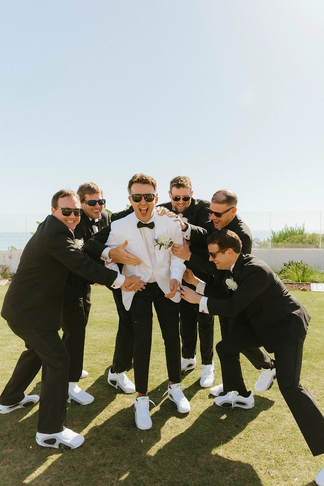 Groom and groomsmen portrait at Dana Point Catholic church wedding — Southern California wedding photographer Tesla Rae Photo based in Huntington Beach