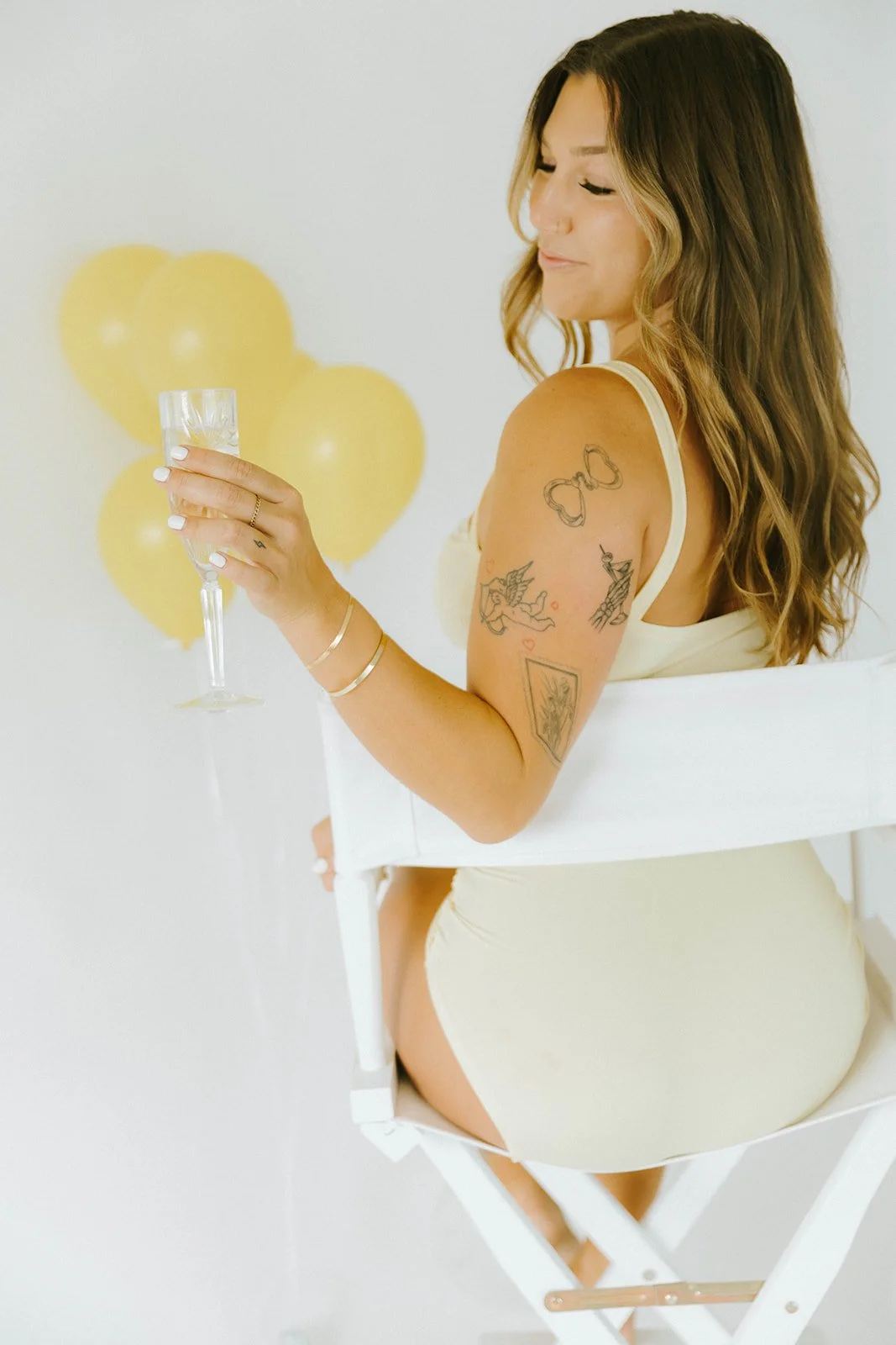 Celebratory, lifestyle birthday portraits of girl holding champagne glass in Huntington Beach, natural light studio — Best brand photographers in Huntington Beach — Captured by Tesla Rae Photo