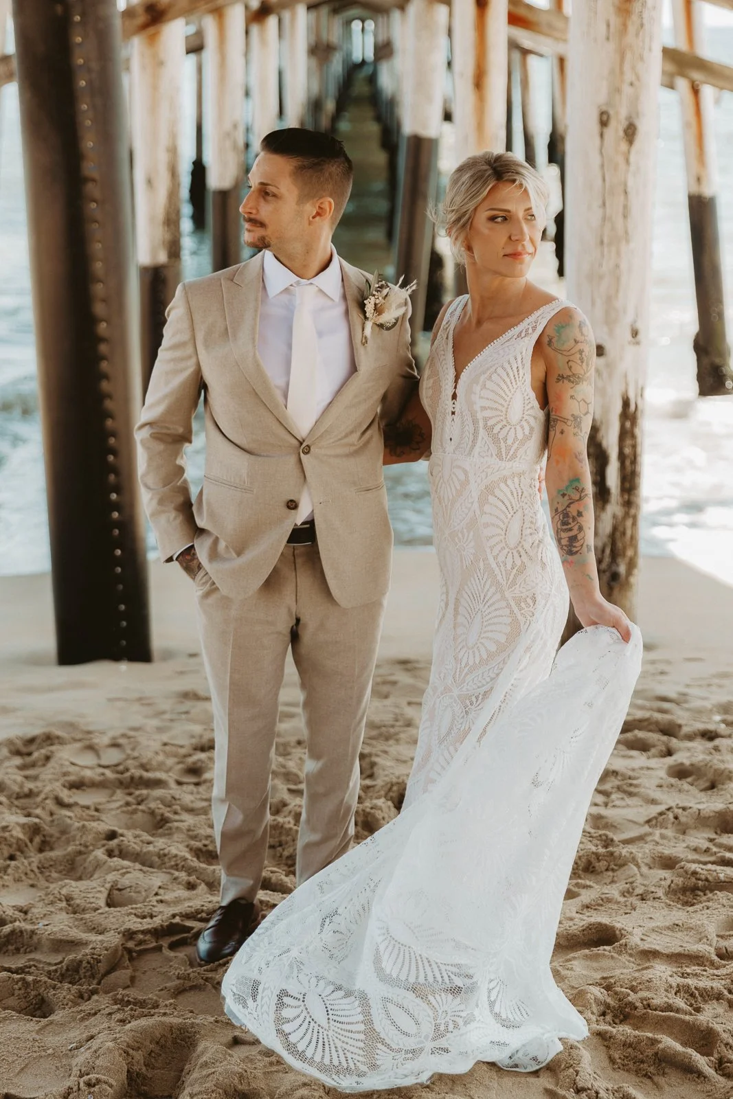 Bride and groom posing at their Newport Beach wedding— Southern California wedding photographer Tesla Rae Photo based in Huntington Beach