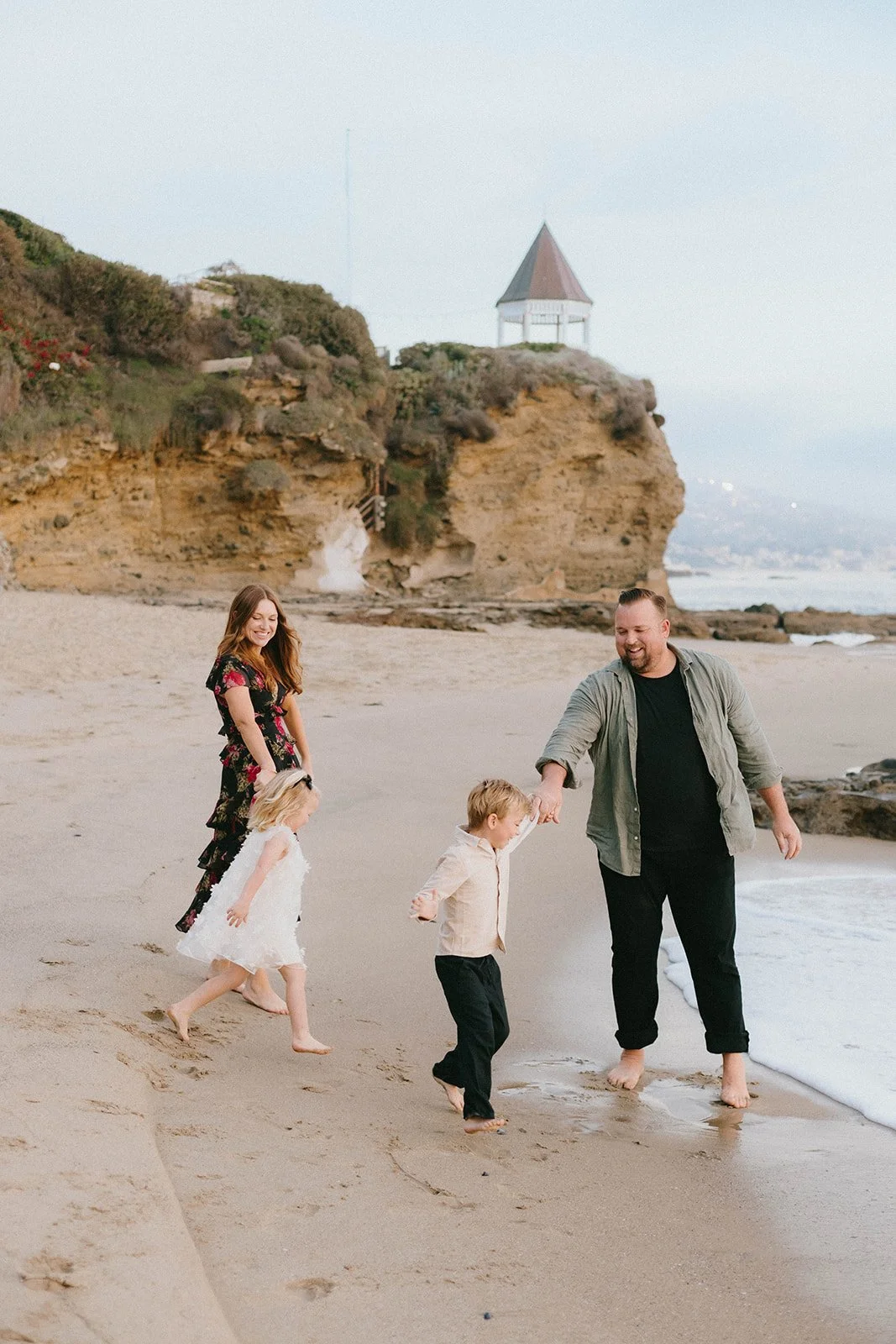 Family portraits at sunset on the beach in Laguna Beach  — Best maternity photographers in Orange County — Tesla Rae Photo