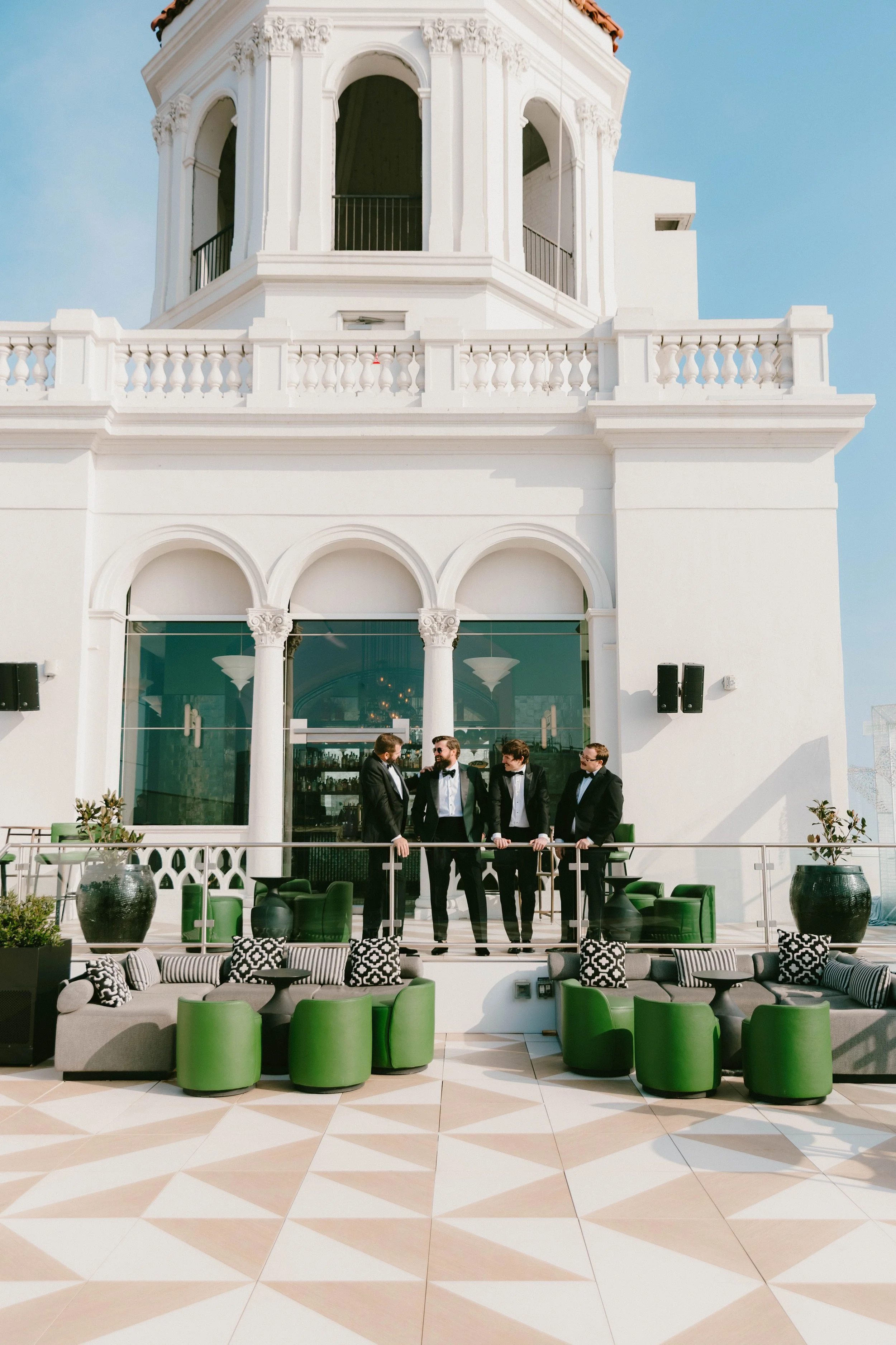 Groom portraits with his groomsmen getting ready at Fairmont Breakers Hotel Long Beach — Long Beach wedding photographer Tesla Rae Photo