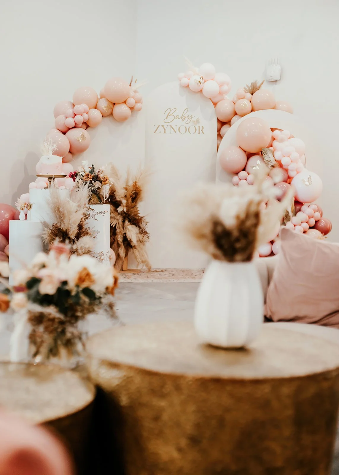 Elegant balloon arch, photo backdrop at high-end baby shower at Fullerton Arboretum — Luxury event photographer Tesla Rae Photo based in Southern California