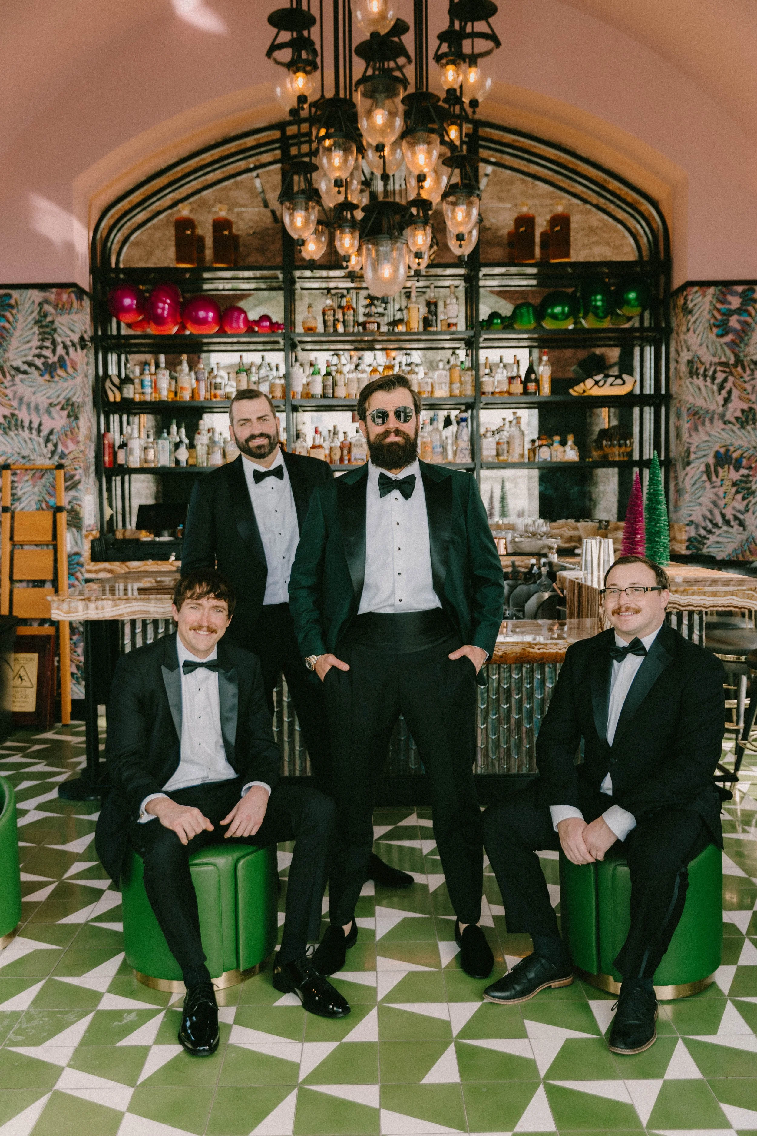 Groom portraits with his groomsmen getting ready at Fairmont Breakers Hotel Long Beach — Long Beach wedding photographer Tesla Rae Photo