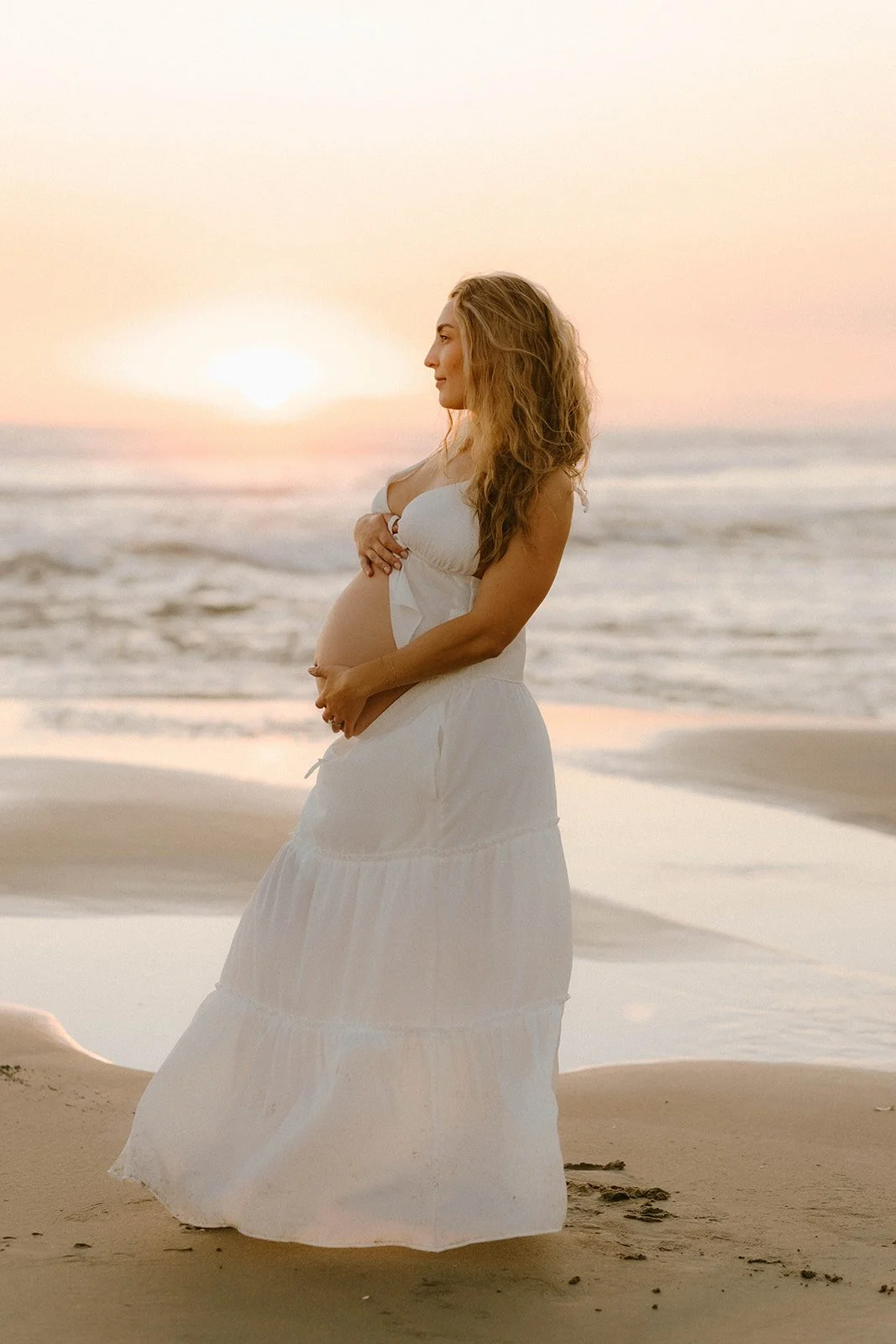 Dreamy maternity portraits at Huntington Beach during golden hour — Award-winning maternity photographer in OC — Tesla Rae Photo