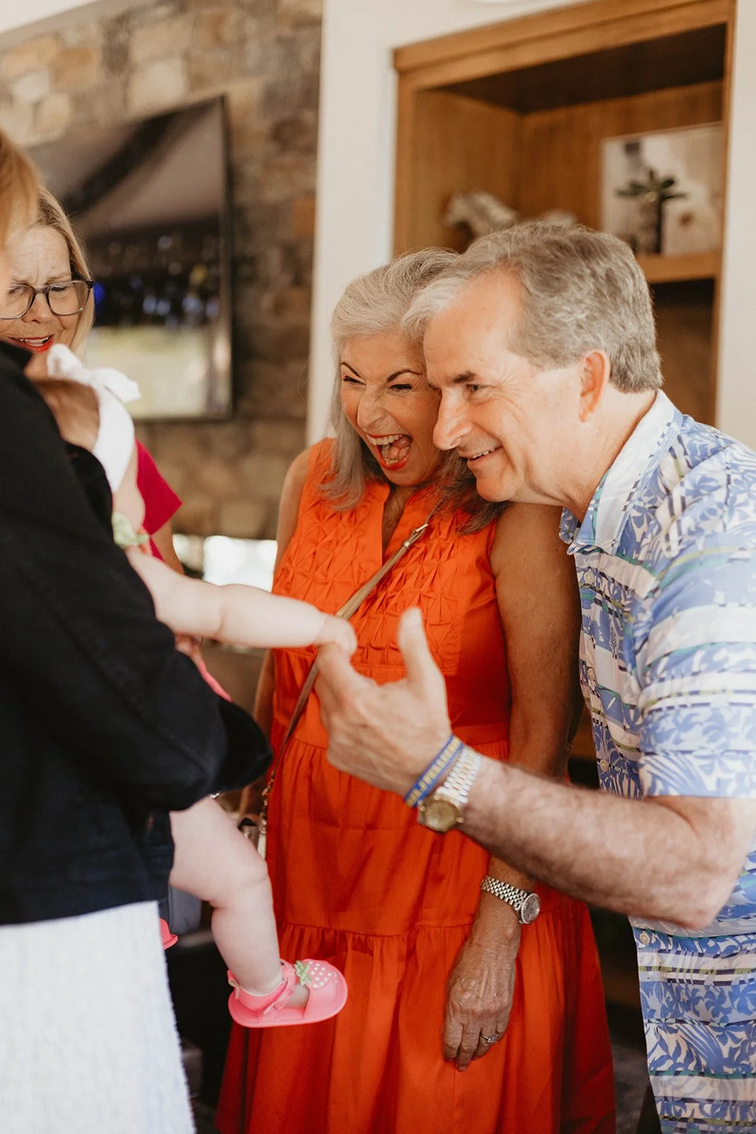 Guests interacting and mingling at upscale baby shower at Nellie Gail Ranch Clubhouse in Laguna Hills - Orange County event photographer Tesla Rae Photo