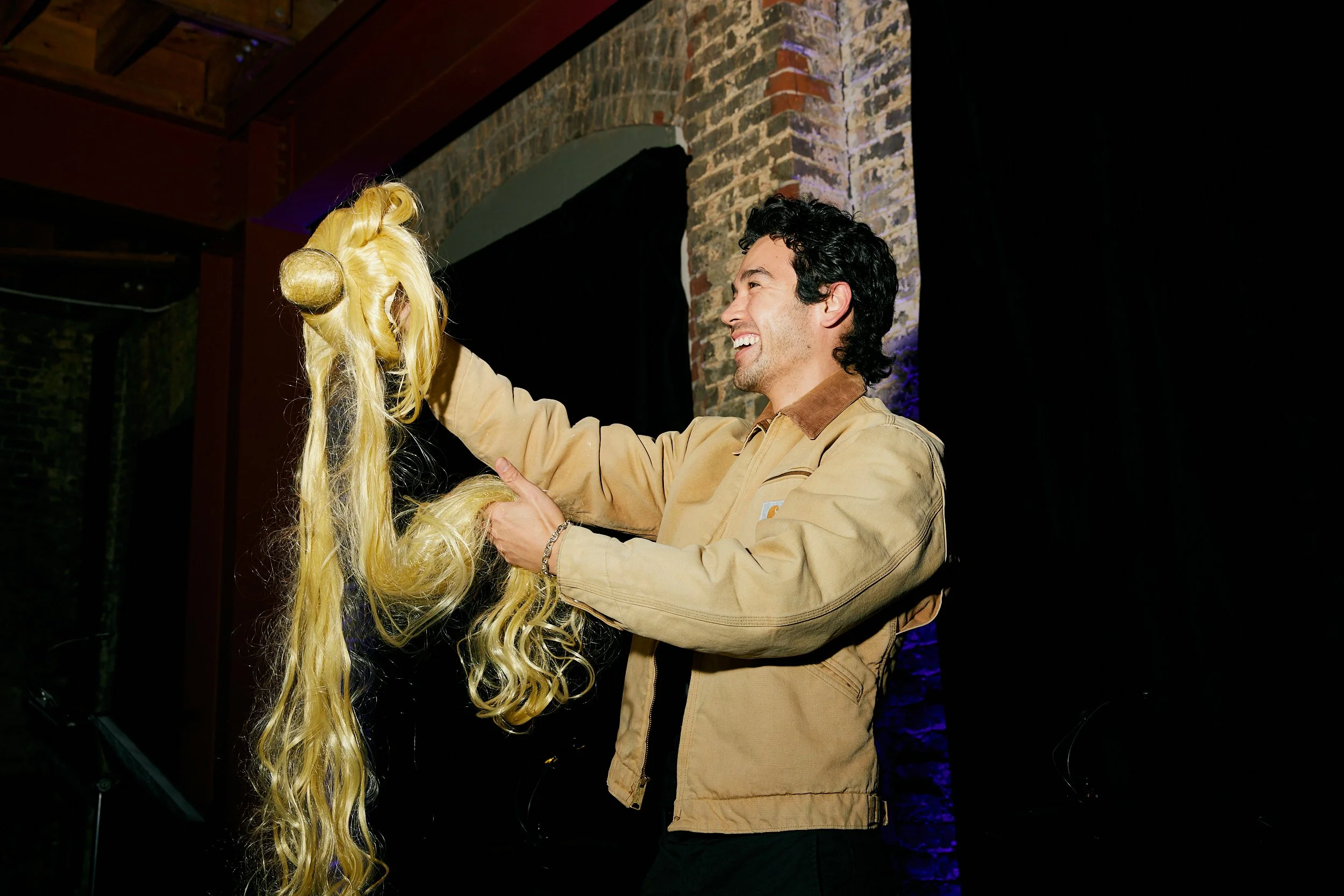 Copy of Kanoa holding wig 2.0.jpg