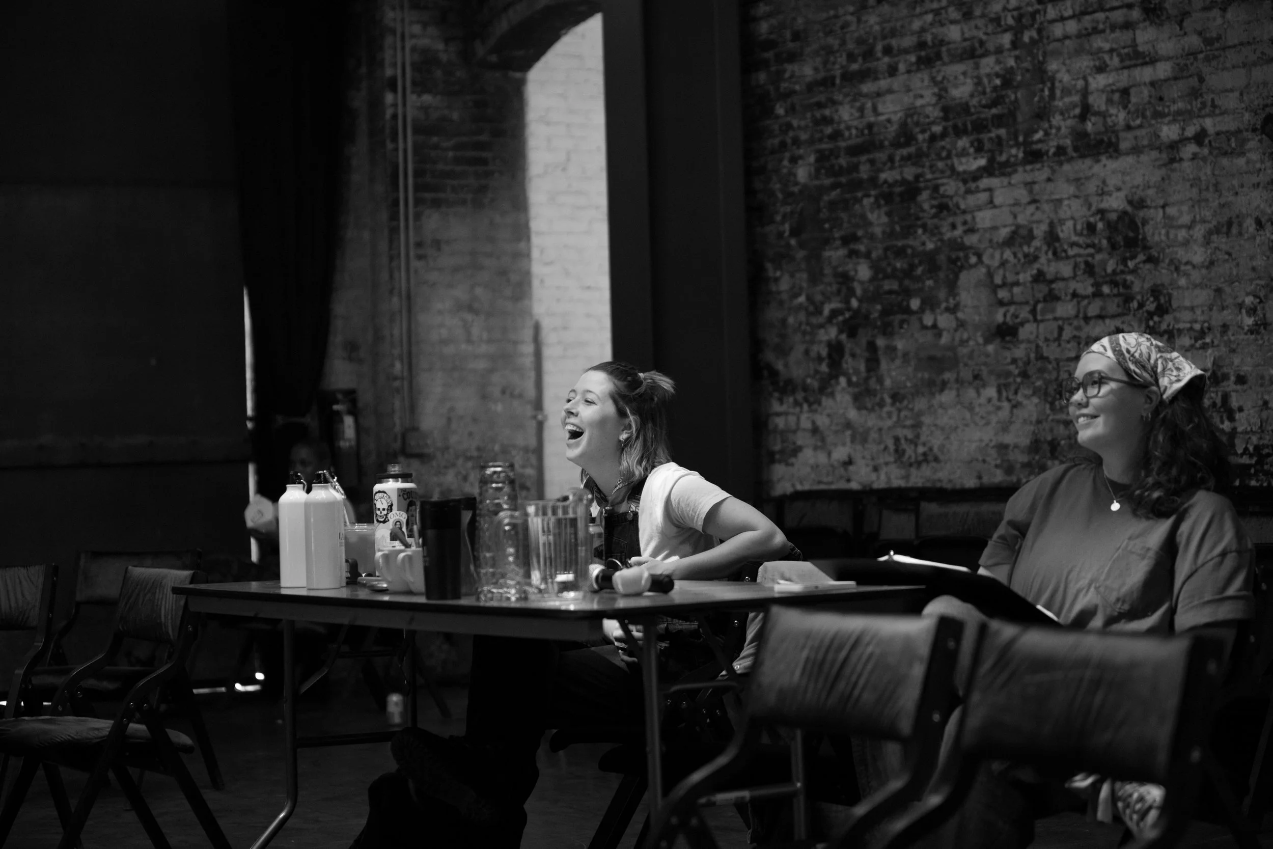 Copy of Reagan and Jo laughing looking at rehearsal B&W.jpg