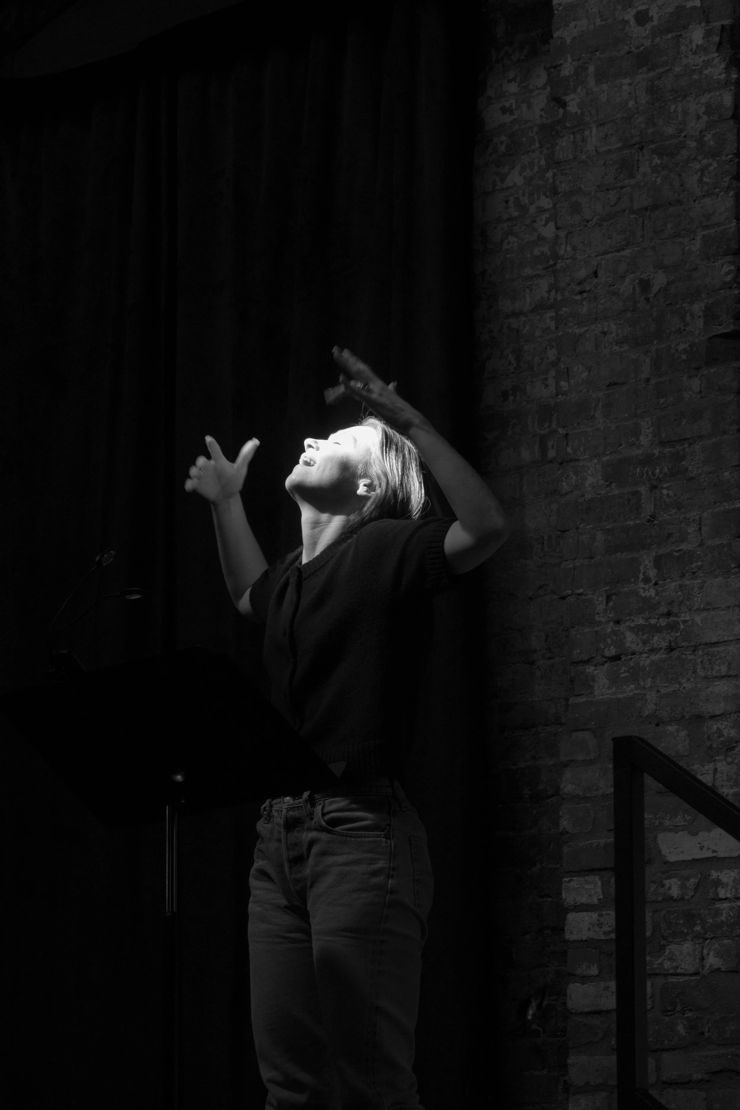 Copy of Jessica reaching up streak of light B&W.jpg