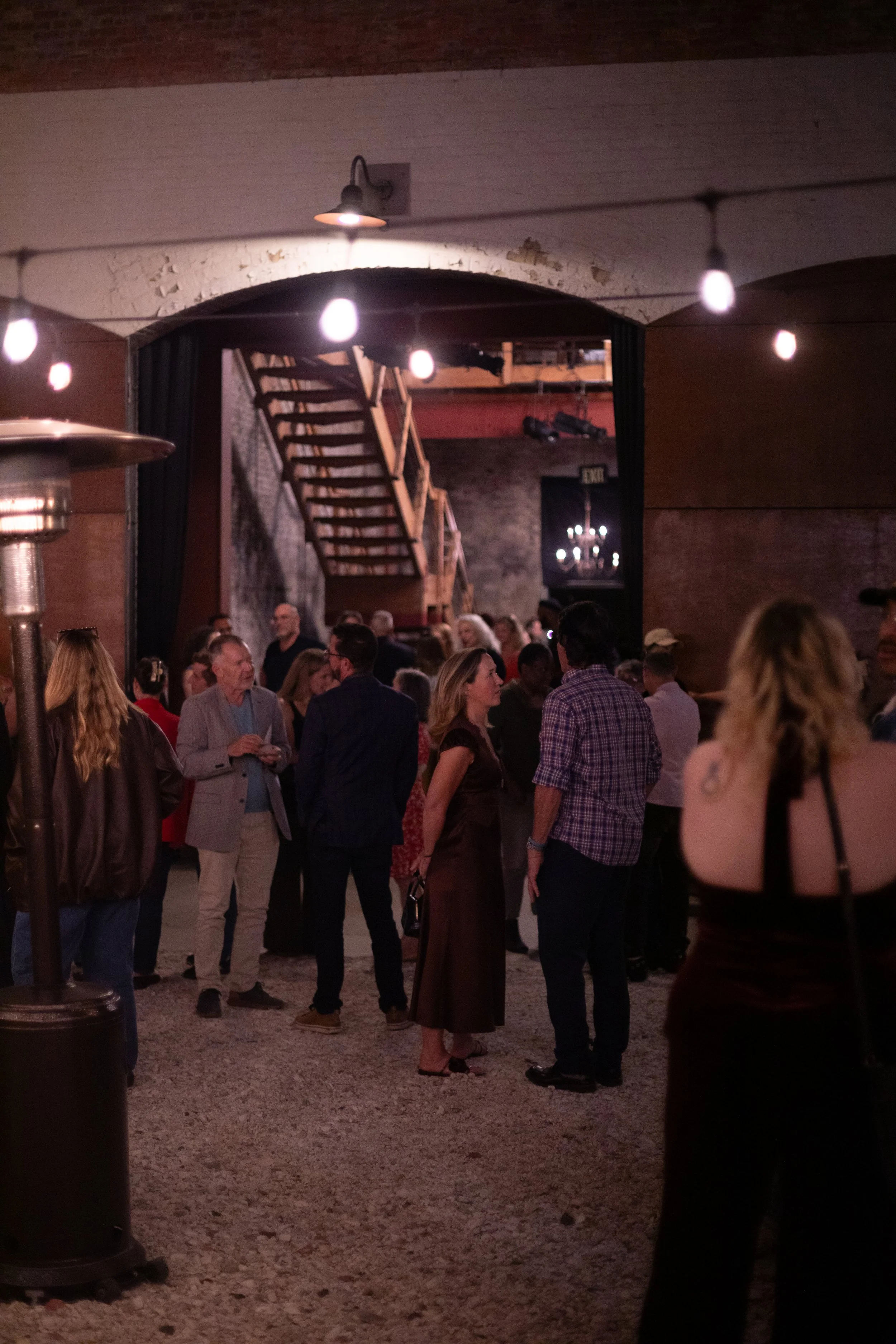 Copy of Post-show mingling with barn door in back.jpg