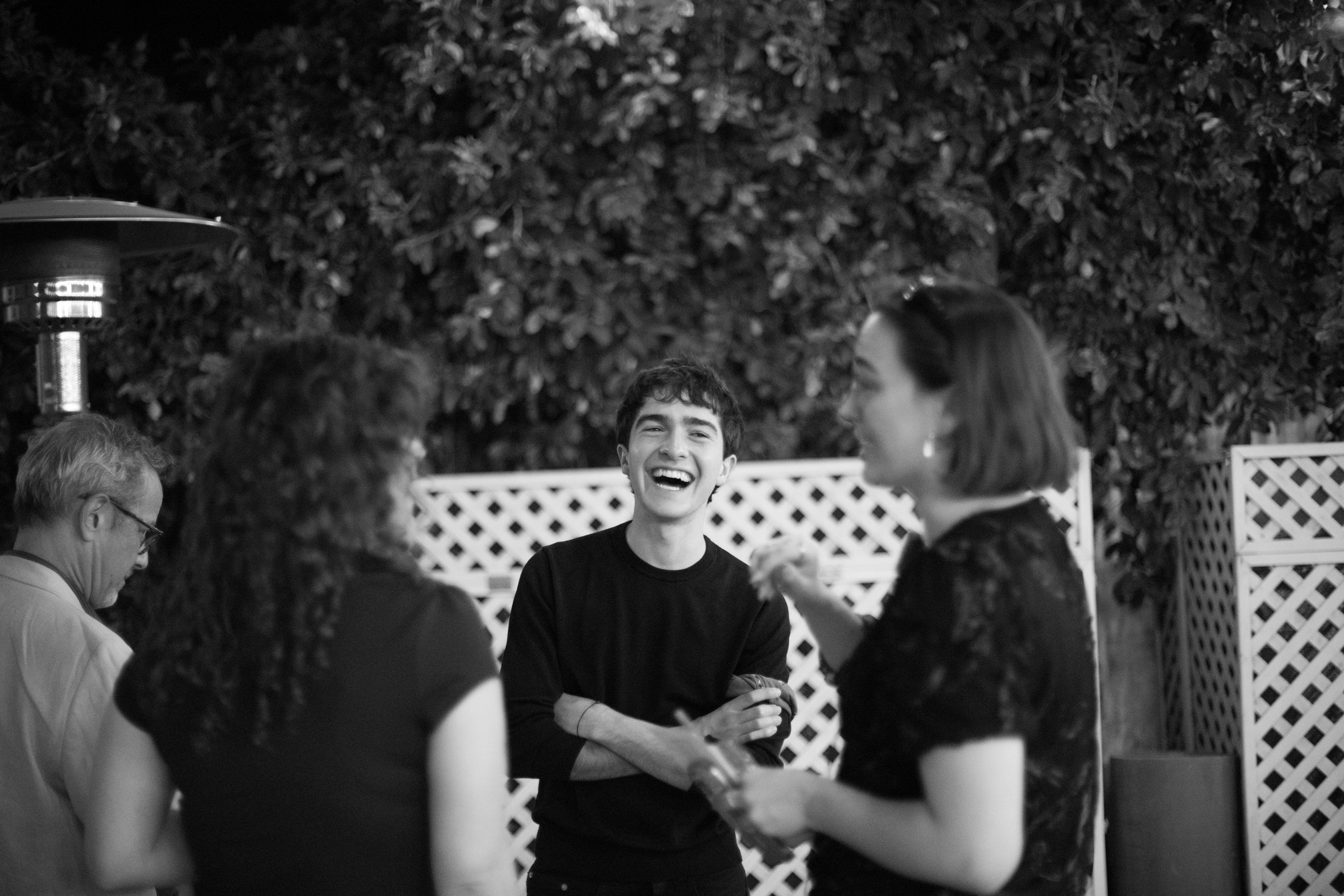 Copy of Volunteers laughing B&W 2.jpg