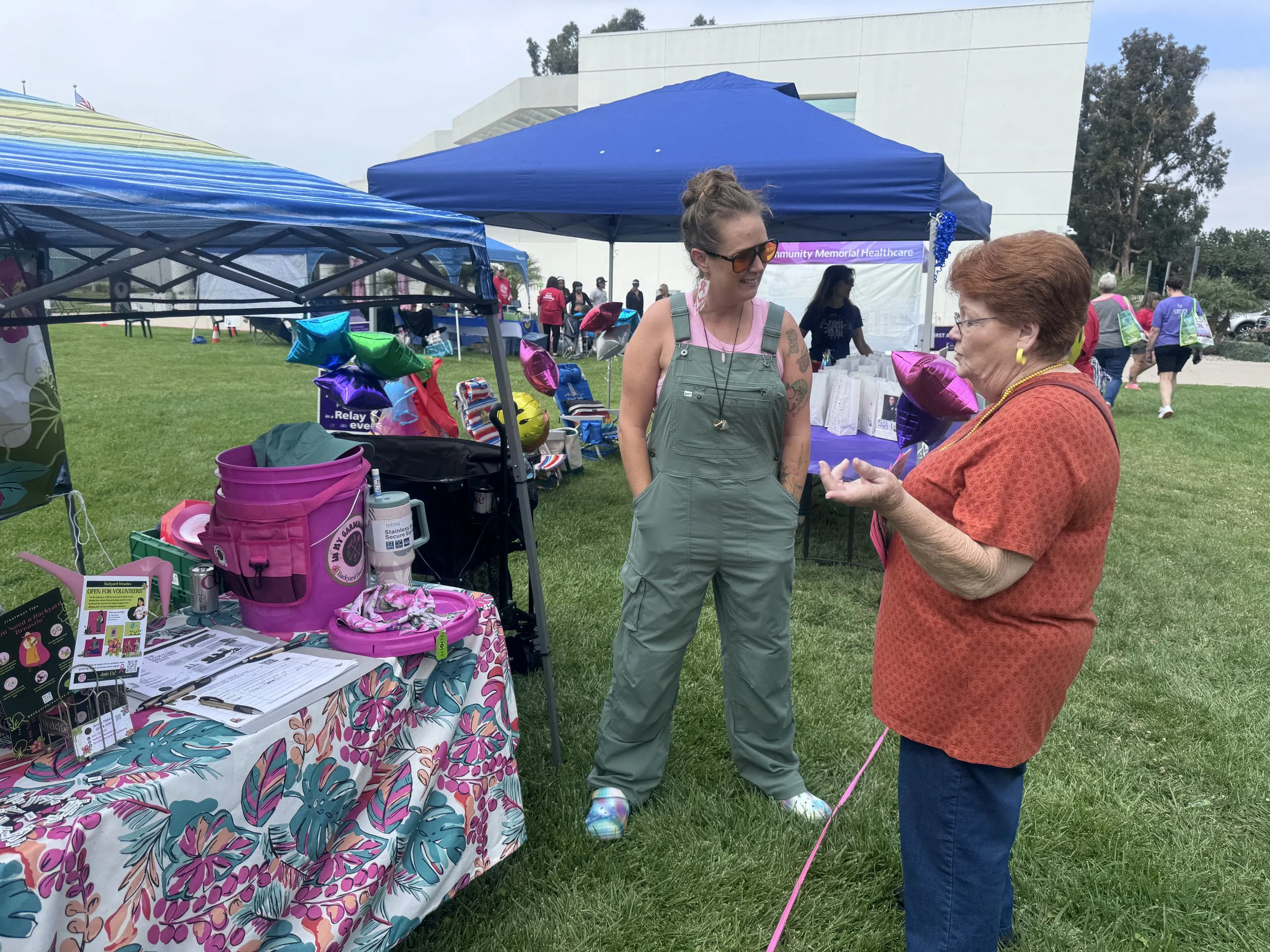 Backyard Breasties volunteers at community event