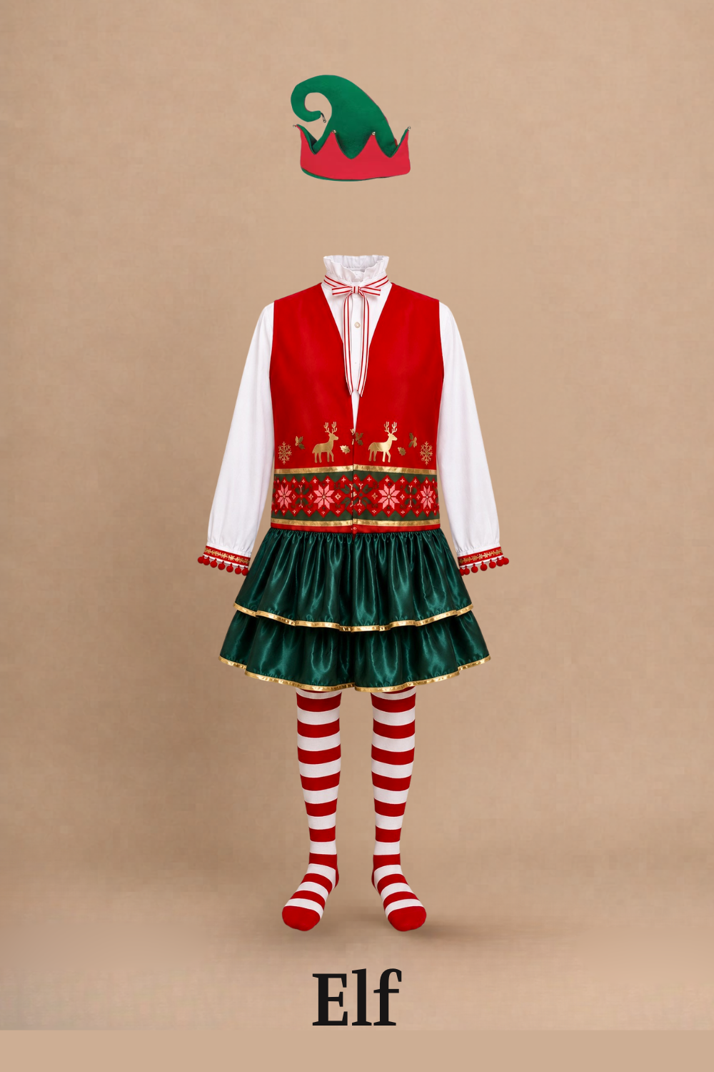 A costume with a green elf hat, a red vest with reindeer and snowflake embroidery, a green satin skirt, and red and white striped stockings, displayed against a beige background. Elf the Musical