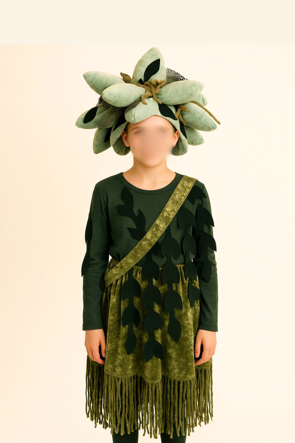 Volunteer-sewn seaweed costume for a youth theater production, featuring a green layered dress with leaf-shaped appliqués, fringe hem for movement, and a headpiece created by upcycling an Amazon succulent pillow for a soft, organic stage look.