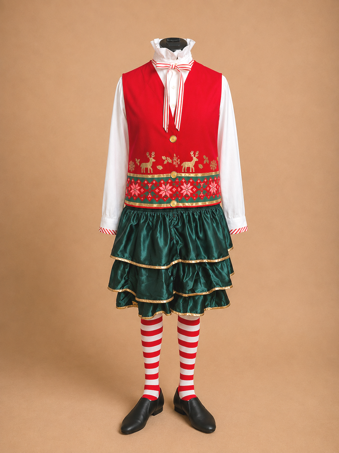 Workshop elf ensemble for Elf Jr. the Musical — red Nordic vest, white shirt with striped bow tie, tiered green ruffled skirt, red and white striped tights and black shoes