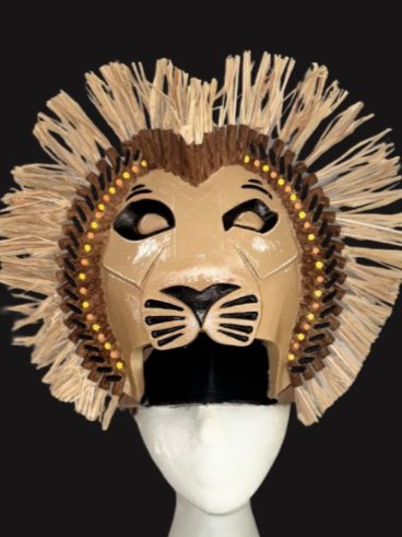 Lion headpiece for The Lion King JR musical, featuring a 3D printed mask with painted facial details and a raffia-style mane, designed as a lightweight, stage-readable headpiece for youth theater productions.