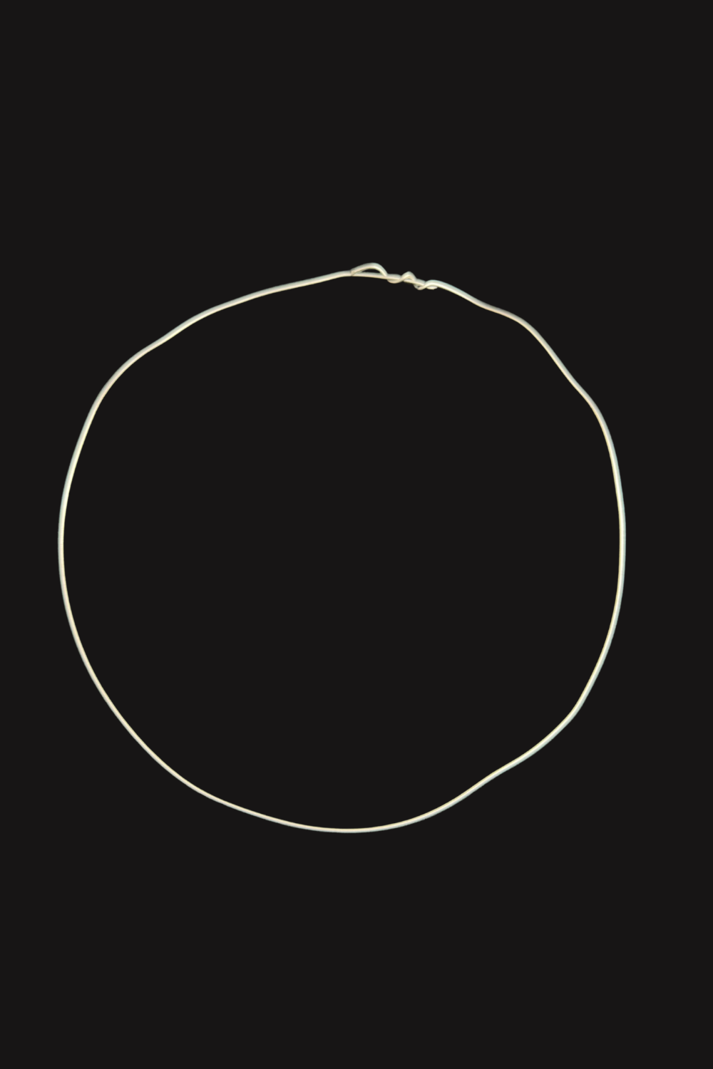 Thin craft wire was bent into a circle to create a lightweight halo frame.