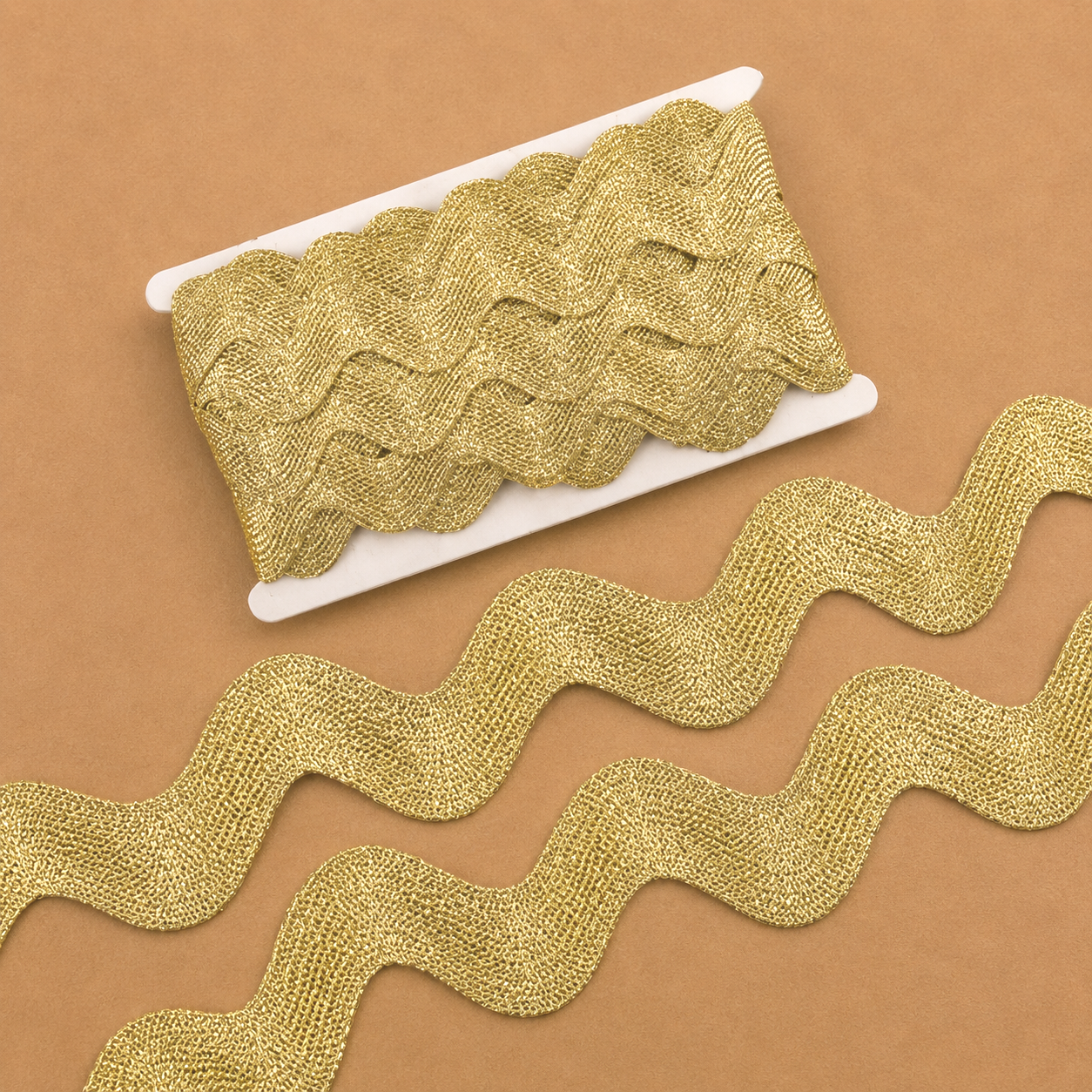 Thick gold ric-rac trim used for Elf Jr. the Musical elf ensemble costumes — simple stage-ready trim that pops under theater lighting. School theater costume notions